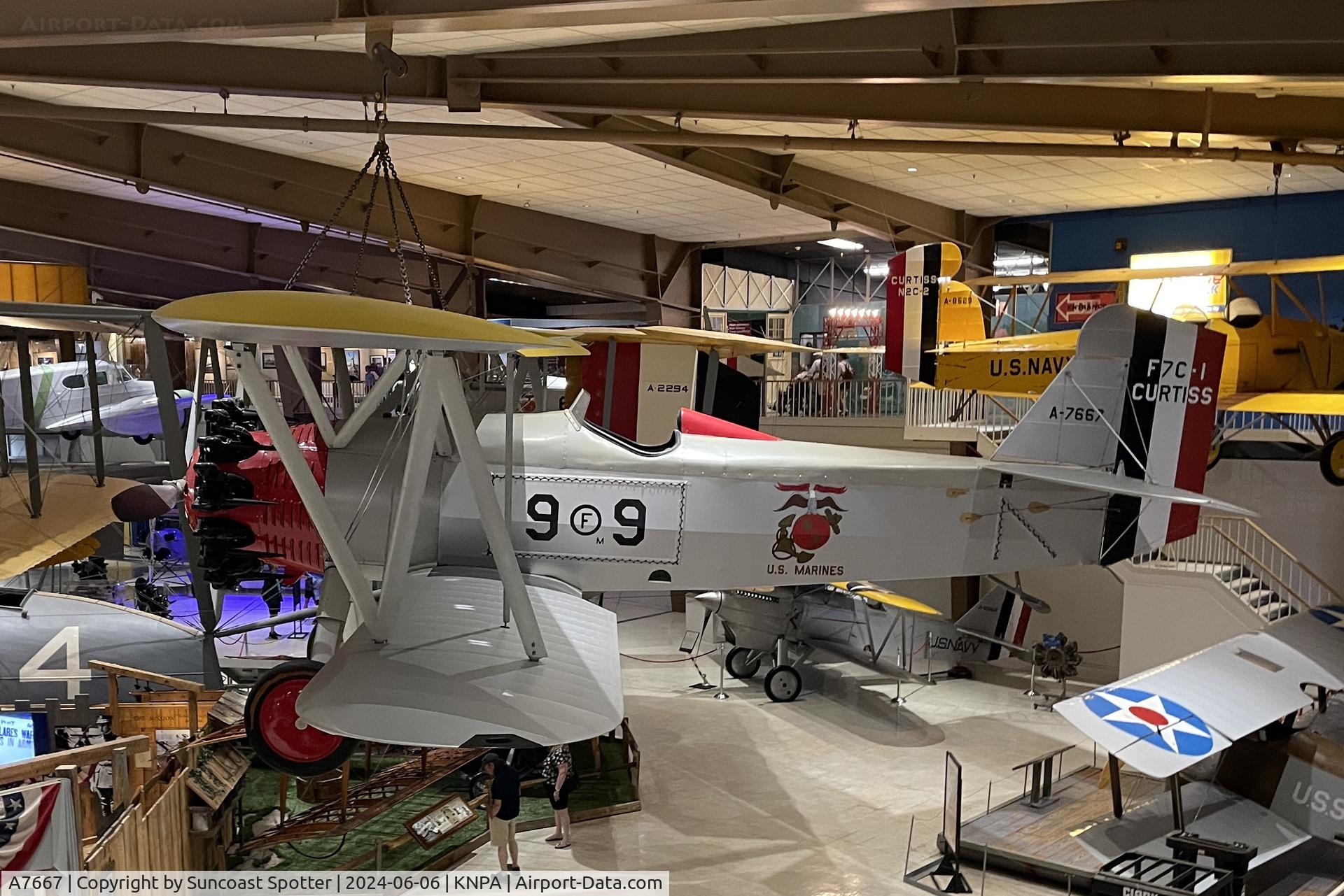 A7667, 1928 Curtiss F7C-1 C/N Not found A-7667, An Marine Corps F6C Hawk from Fighting Squadron 9M at Brown Field sits on display at the National Naval Aviation Museum