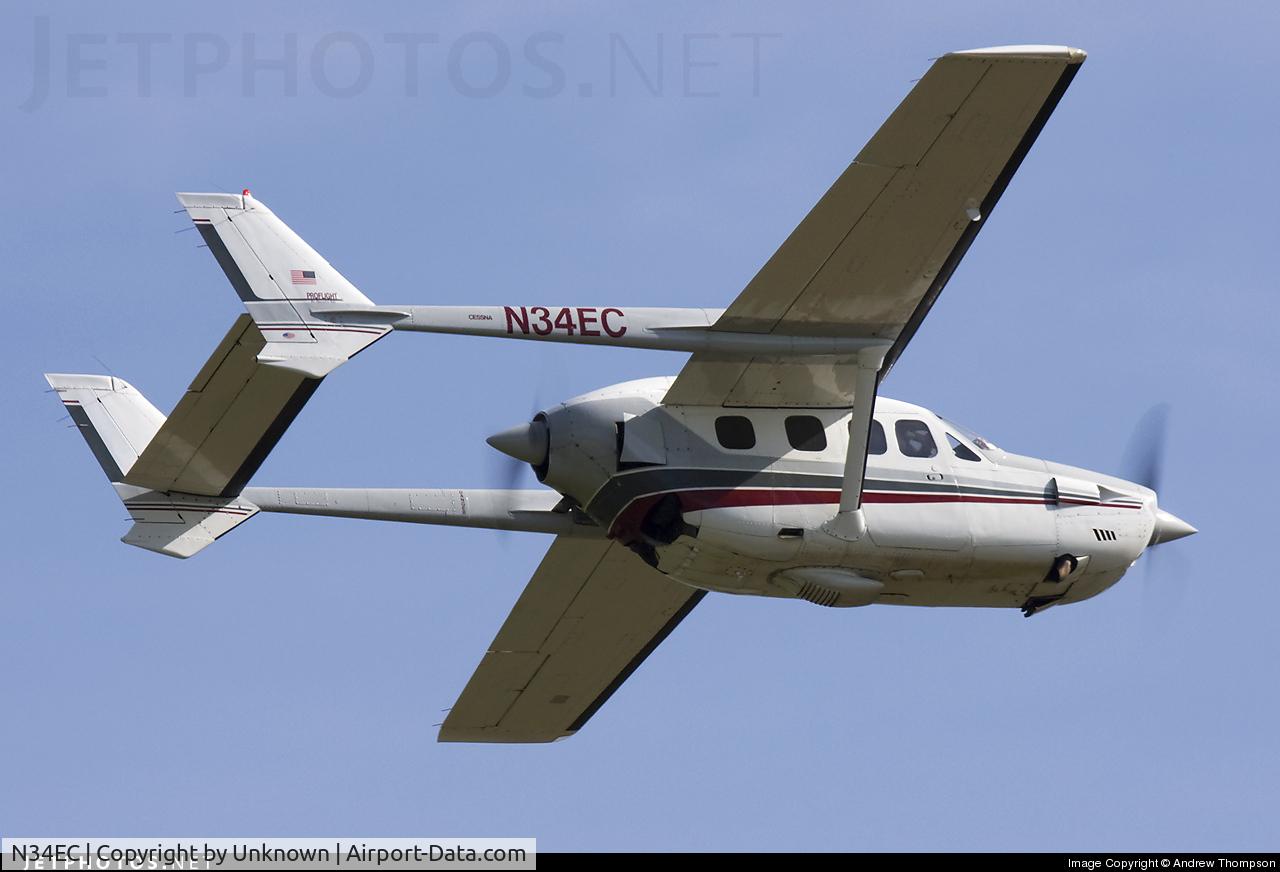 N34EC, 1975 Cessna T-337G C/N P3370224, Ground view fly-over from unknown photographer.