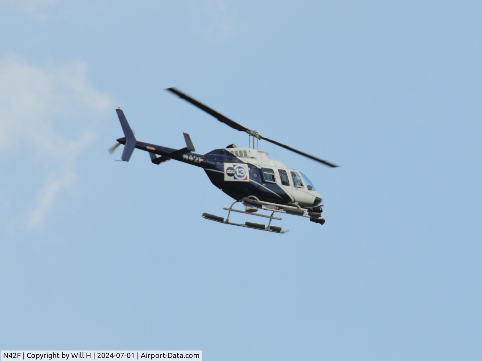 N42F, 1994 Bell 206L-4 LongRanger IV LongRanger C/N 52100, ABC13 copter getting footage nearby, hovering around 700'. Nikon D7100, f/7.1, 1/800exp, ISO200, 200mm
