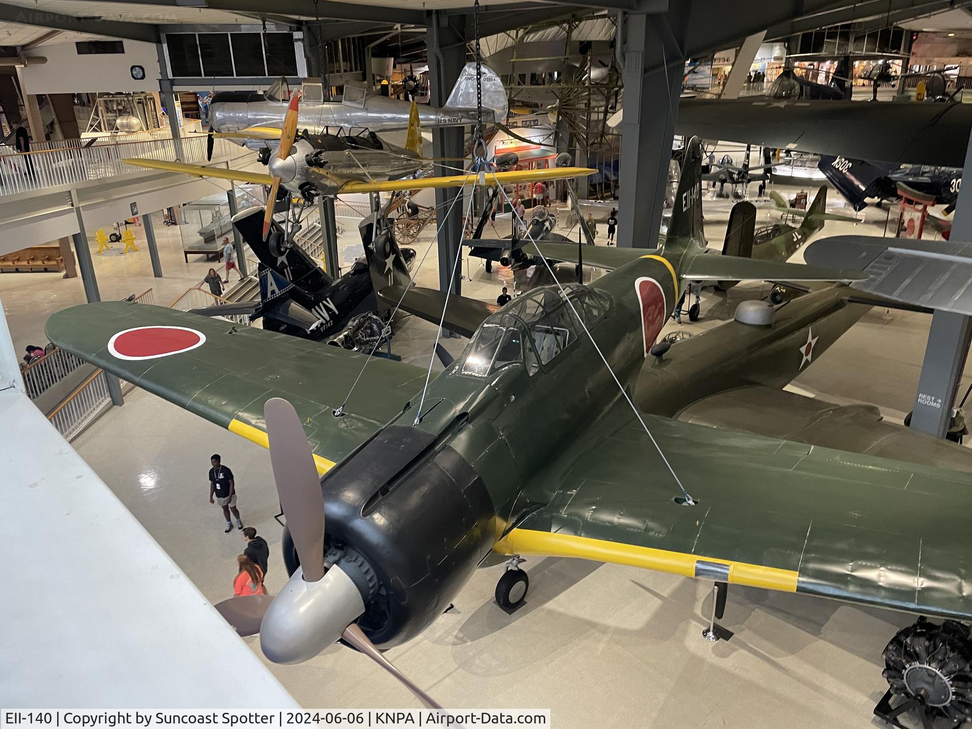 EII-140, 1942 Nakajima A6M2 Model 21 C/N 5450, An Imperial Japanese Navy Air Force A6M Zero sits on display at the National Naval Aviation Museum