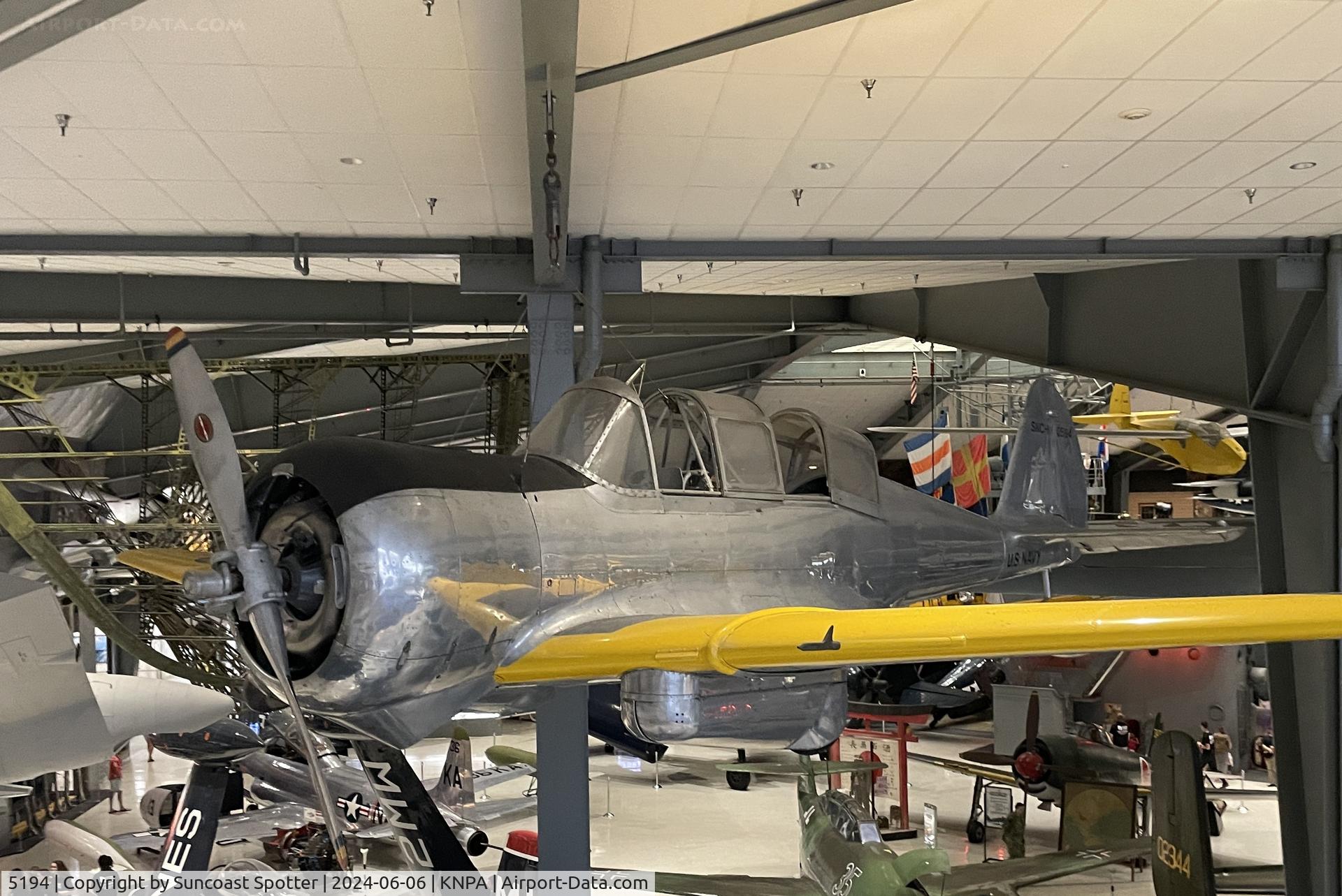 5194, , An US Navy SNC-1 Falcon sits on display at the National Naval Aviation Museum
