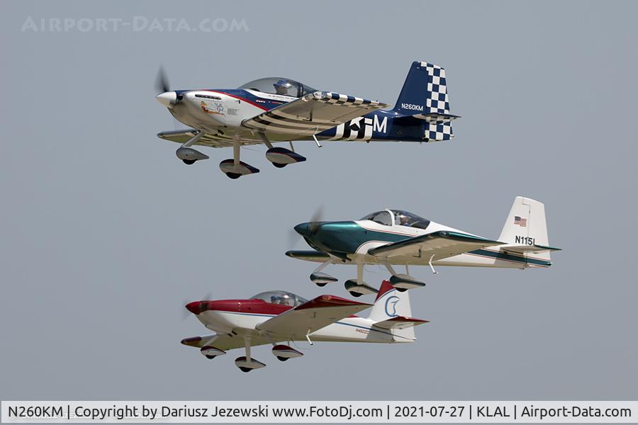 N260KM, 2015 Vans RV-7A C/N 70802, RV airplanes taking off for large formation flight over Oshkosh grounds