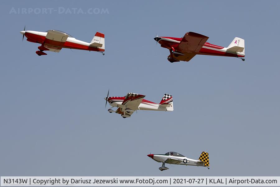 N3143W, 1991 Vans RV-4 C/N 1920, RV airplanes taking off for large formation flight over Oshkosh grounds