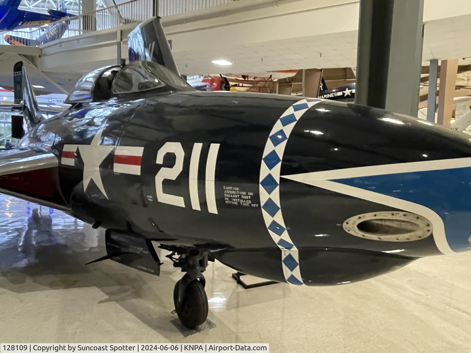 128109, 1952 Grumman F9F-6 Cougar C/N Not found 128109, An US Navy F9F Cougar sits on display at the National Naval Aviation Museum