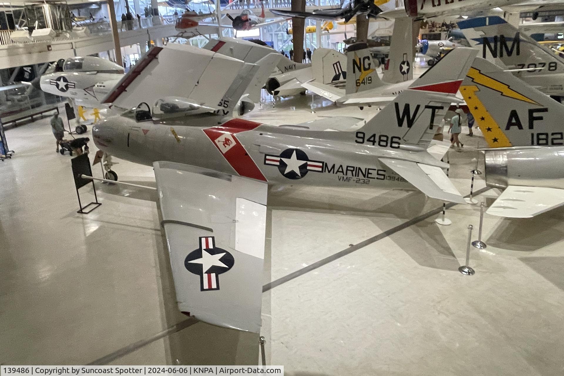 139486, 1957 North American FJ-4 Fury C/N 209-106, An US Marine Corps FJ-4 Fury from Marine Fighter Squadron 232 at Marine Corps Air Station Kaneohe Bay on display at the National Naval Aviation Museum