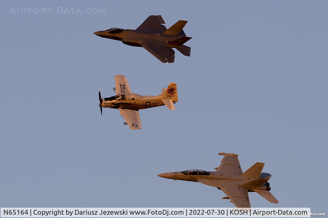 N65164, 1955 Douglas EA-1E Skyraider AD-5W C/N 55-471DH, The US Navy F-35C Lightning II and EA-18G Growler Demonstration Teams formation with an AD-5 Skyraider in US N