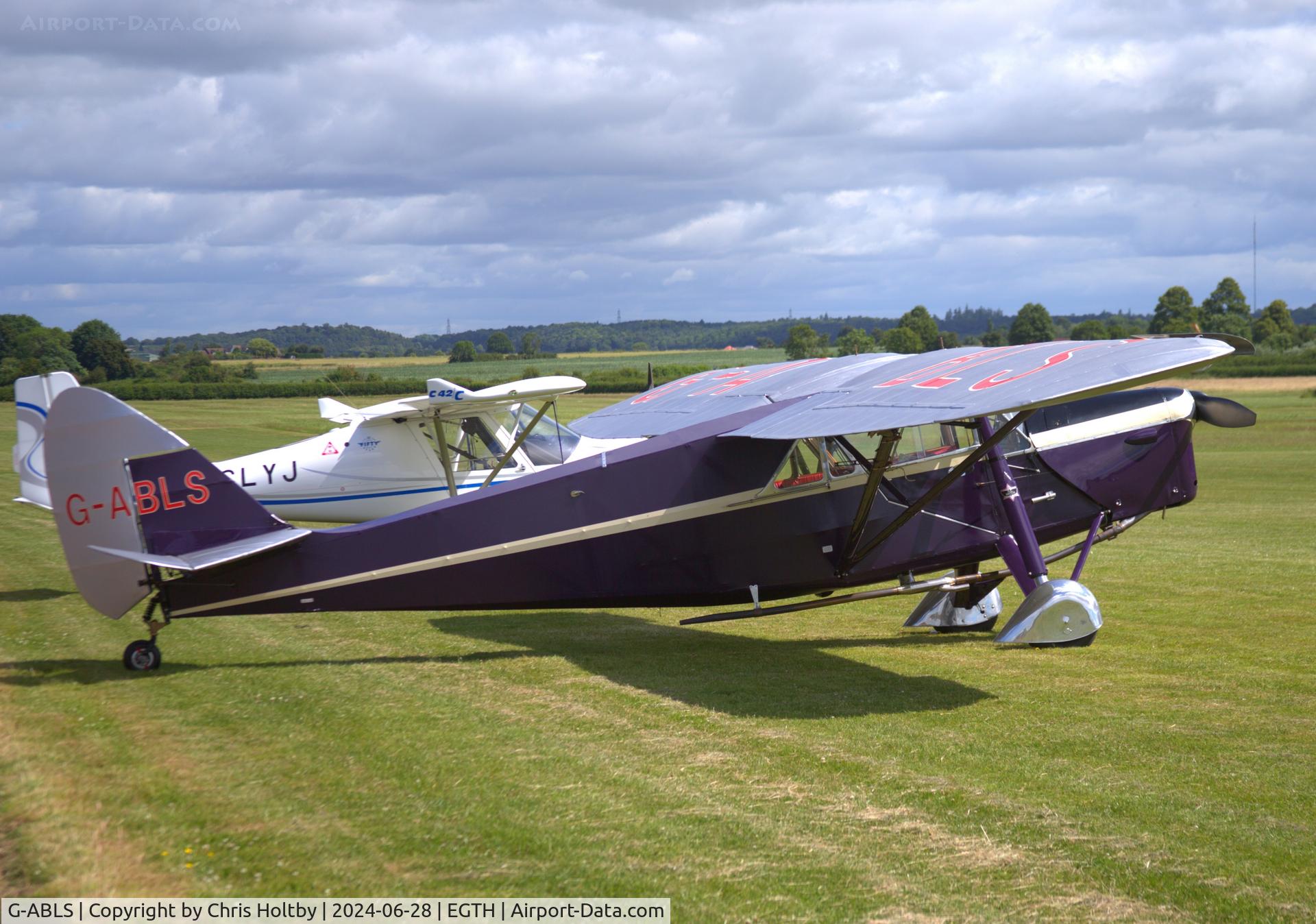 G-ABLS, 1931 De Havilland DH.80A Puss Moth C/N 2164, Parked at Old Warden Airfield ready for the Festival of Flight Airshow.