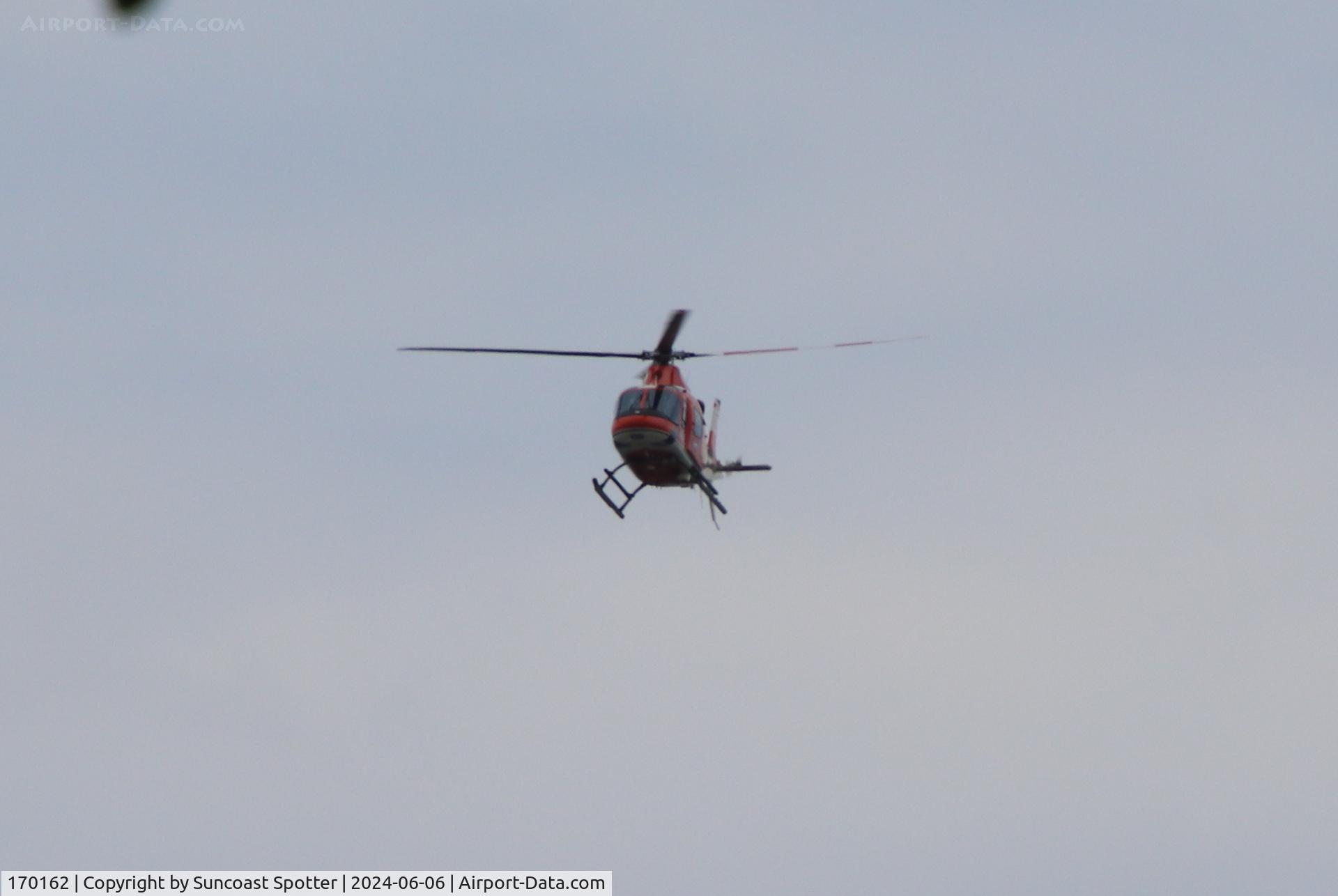 170162, Leonardo TH-73A Thrasher C/N 15825, A US Navy TH-73A Thrasher from Helicopter Training Squadron 8 at Naval Air Station Whiting Field flies over downtown Pensacola