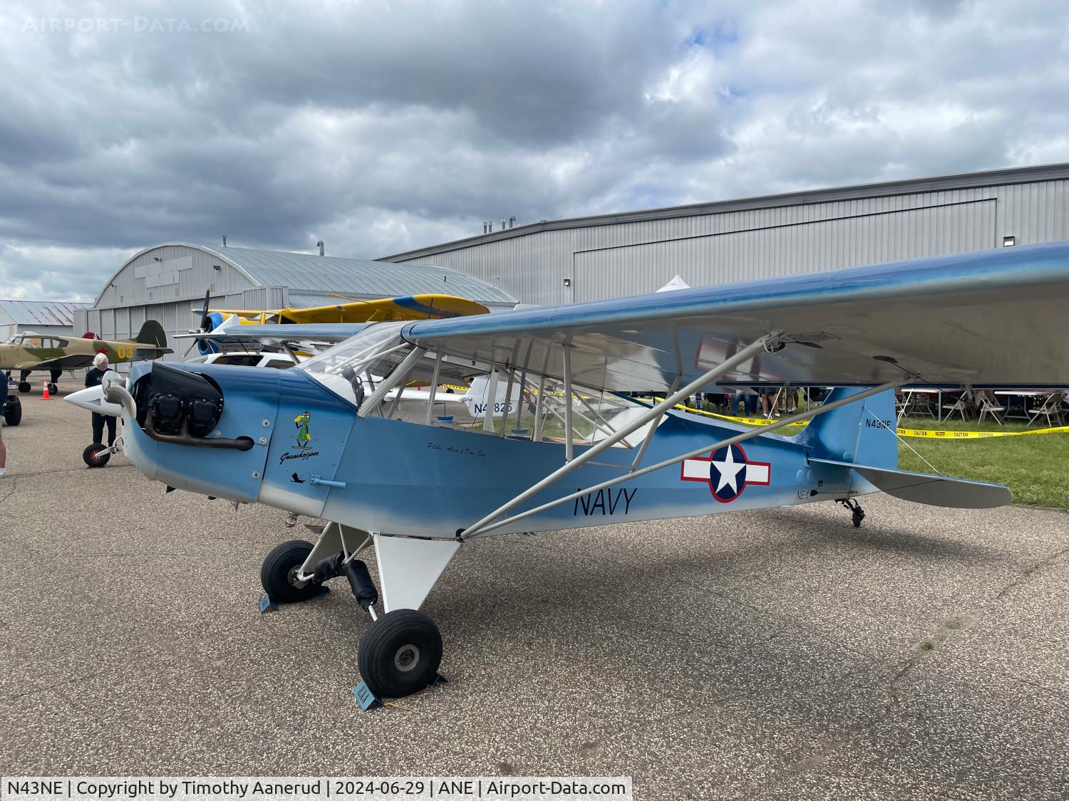 N43NE, 2004 Wag-Aero Sport Trainer C/N 676, Is that Piper Cub? Nah. Cubs are yellow.  Is that Navy NE-1?  No it's not a restoration and it's not an L-Bird.  Well, what does it fly like?  What else would it fly like?  It flies like Cub   Sport Aviation February 2006