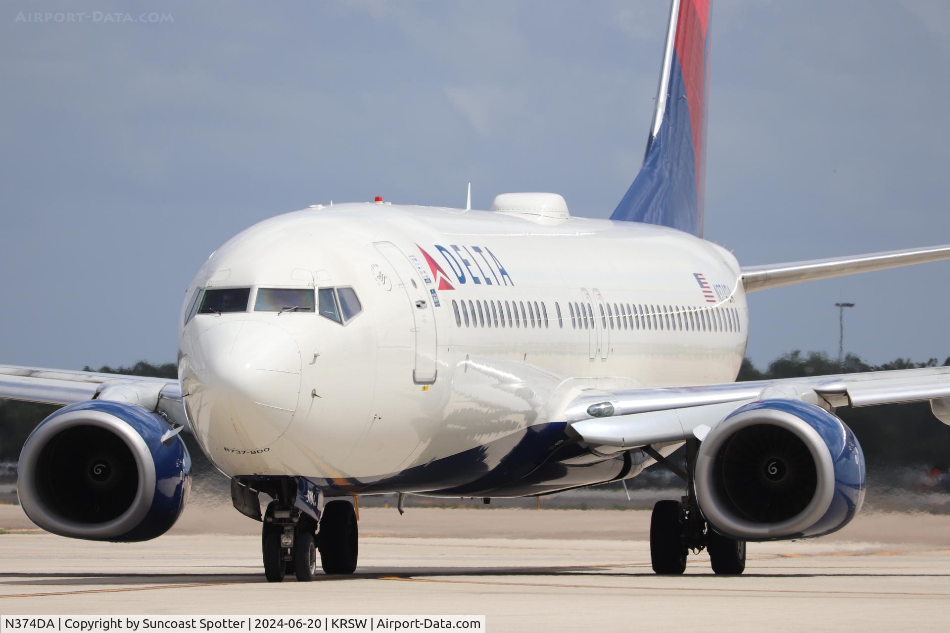 N374DA, 1998 Boeing 737-832 C/N 29622, Delta Flight 2519 taxis at Southwest Florida International Airport prior to flight to Boston Logan International Airport