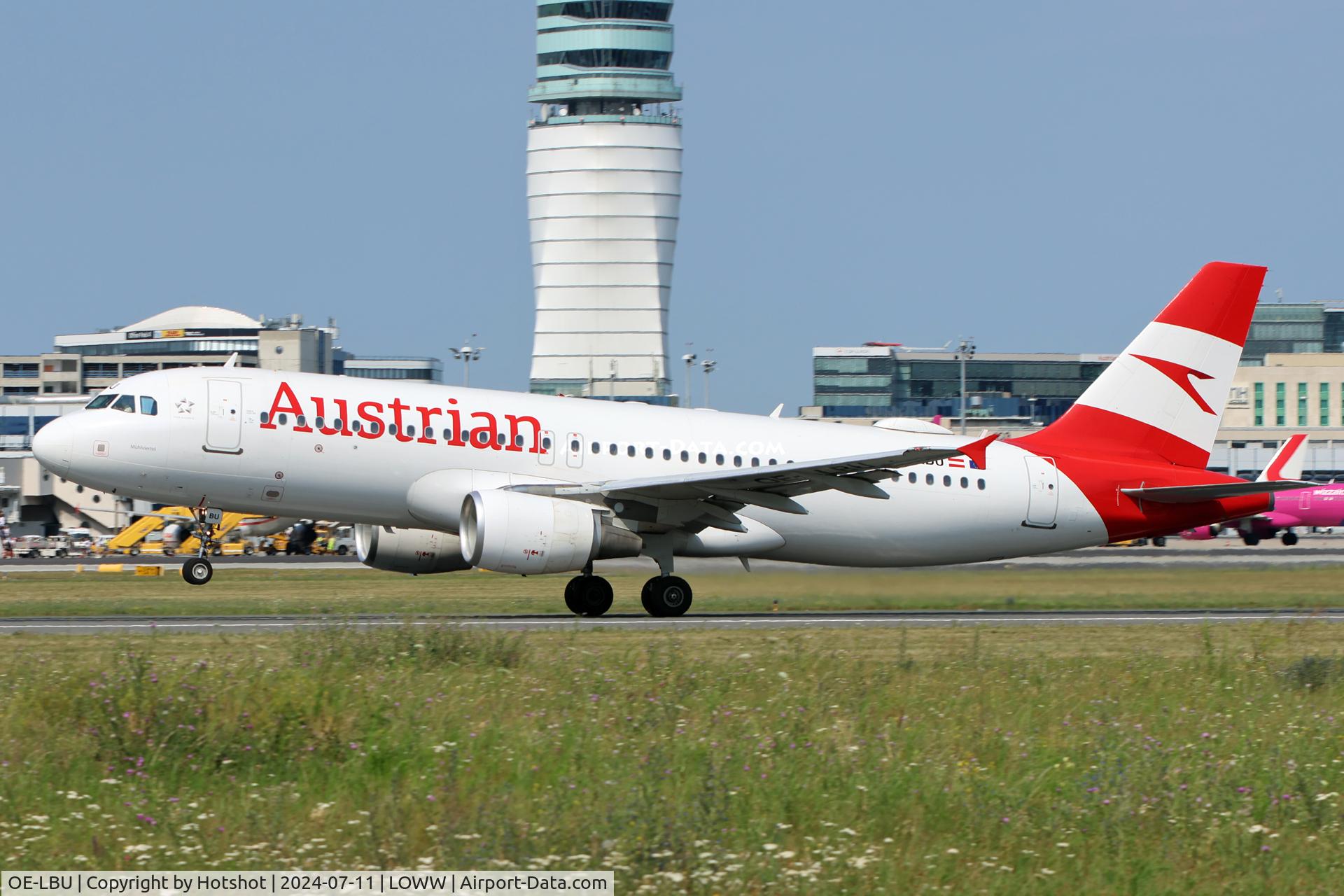 OE-LBU, 2001 Airbus A320-214 C/N 1478, Rotating in front of the ATC tower