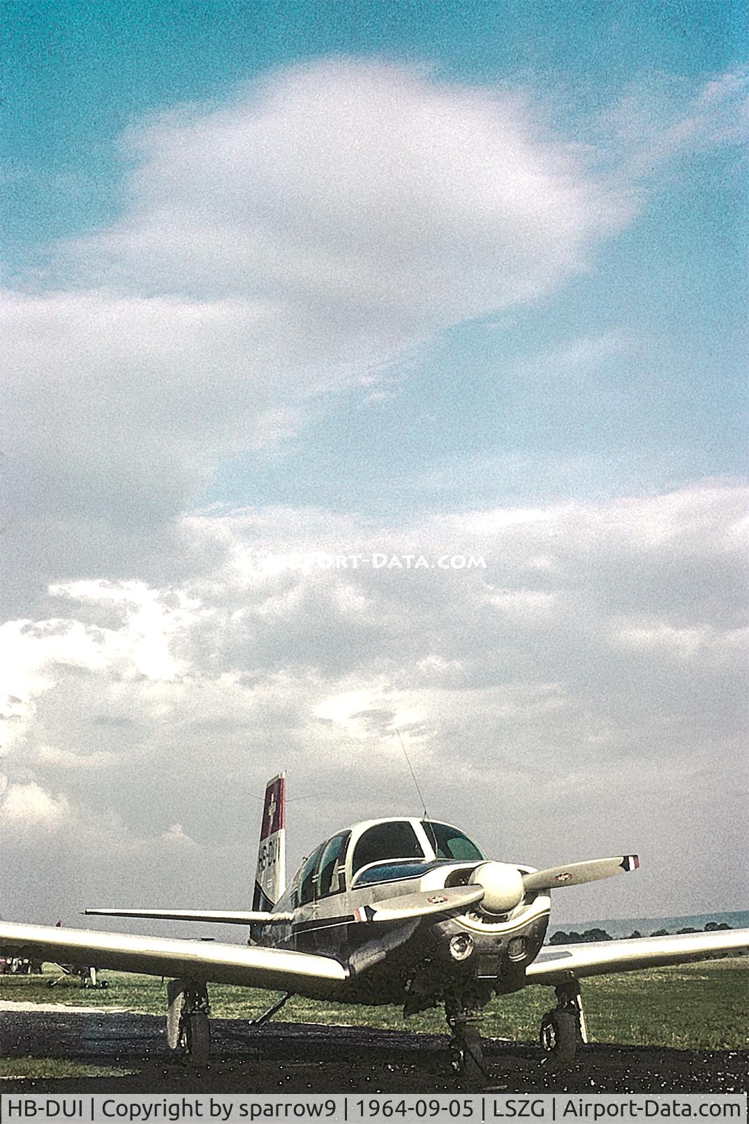 HB-DUI, 1959 Mooney M20A C/N 1422, At Grenchen with towering cumulus