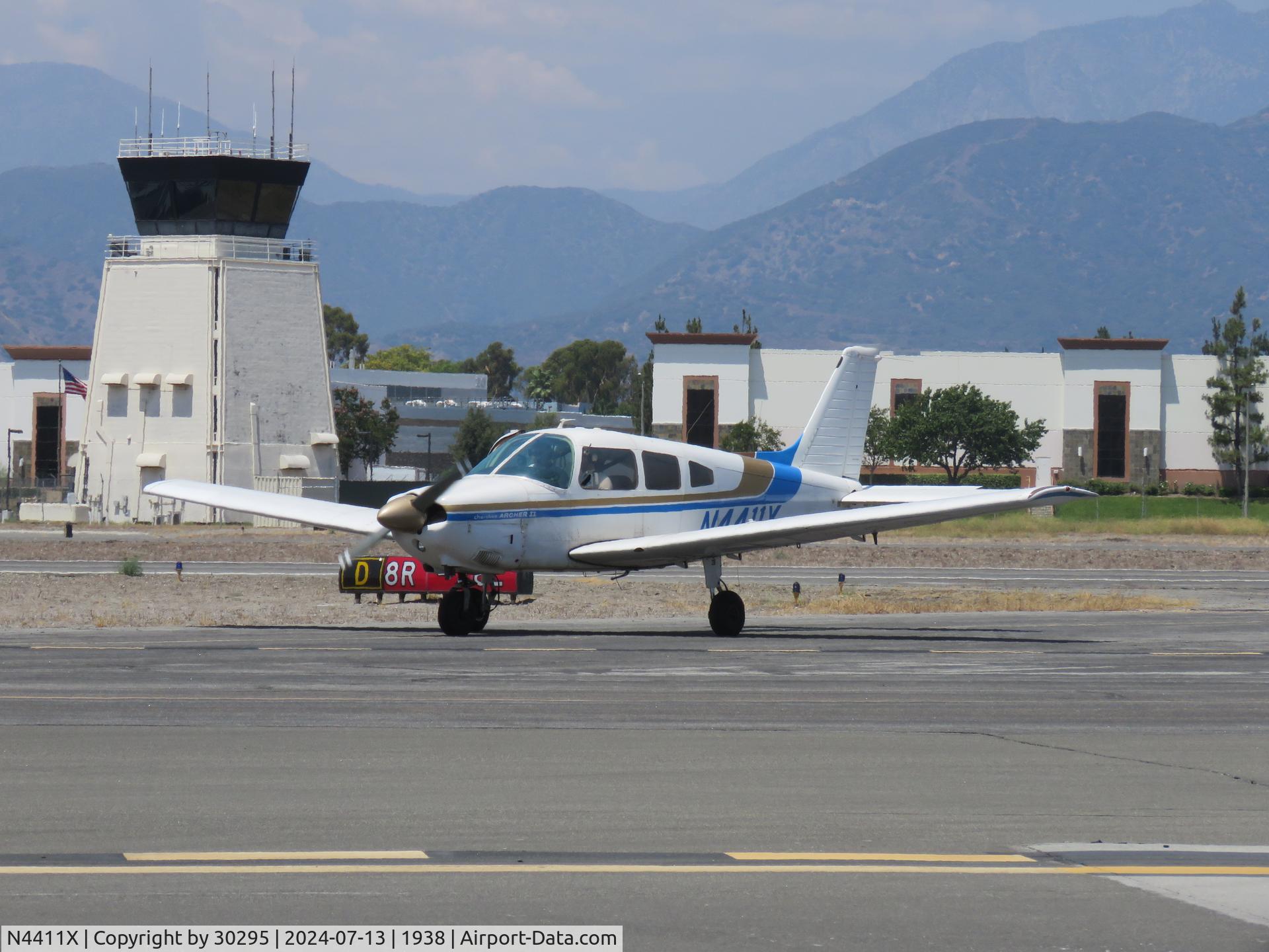 N4411X, 1975 Piper PA-28-181 C/N 28-7690013, Leaving runway