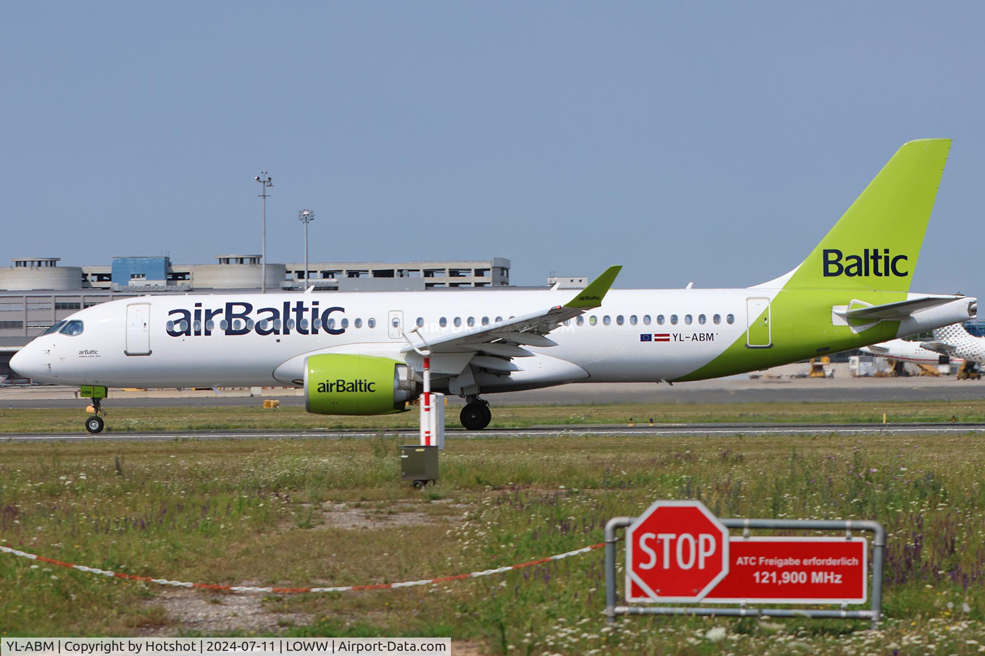 YL-ABM, 2022 Airbus A220-300 C/N 55191, Rolling on runway 29 with warning sign and the mid-point transmissiometer in the foreground