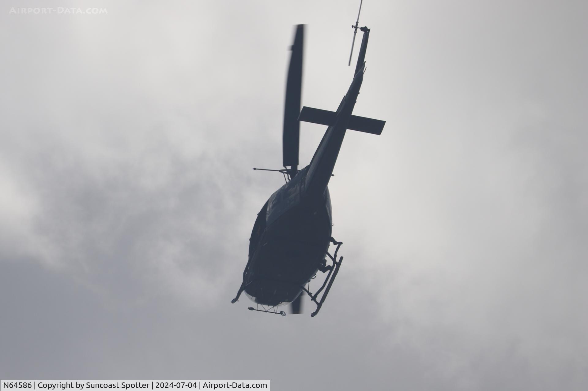 N64586, 1964 Bell UH-1H Iroquois C/N 64-13586 (4293), Charlotte County Sheriff’s Office Aviation flies over Englewood