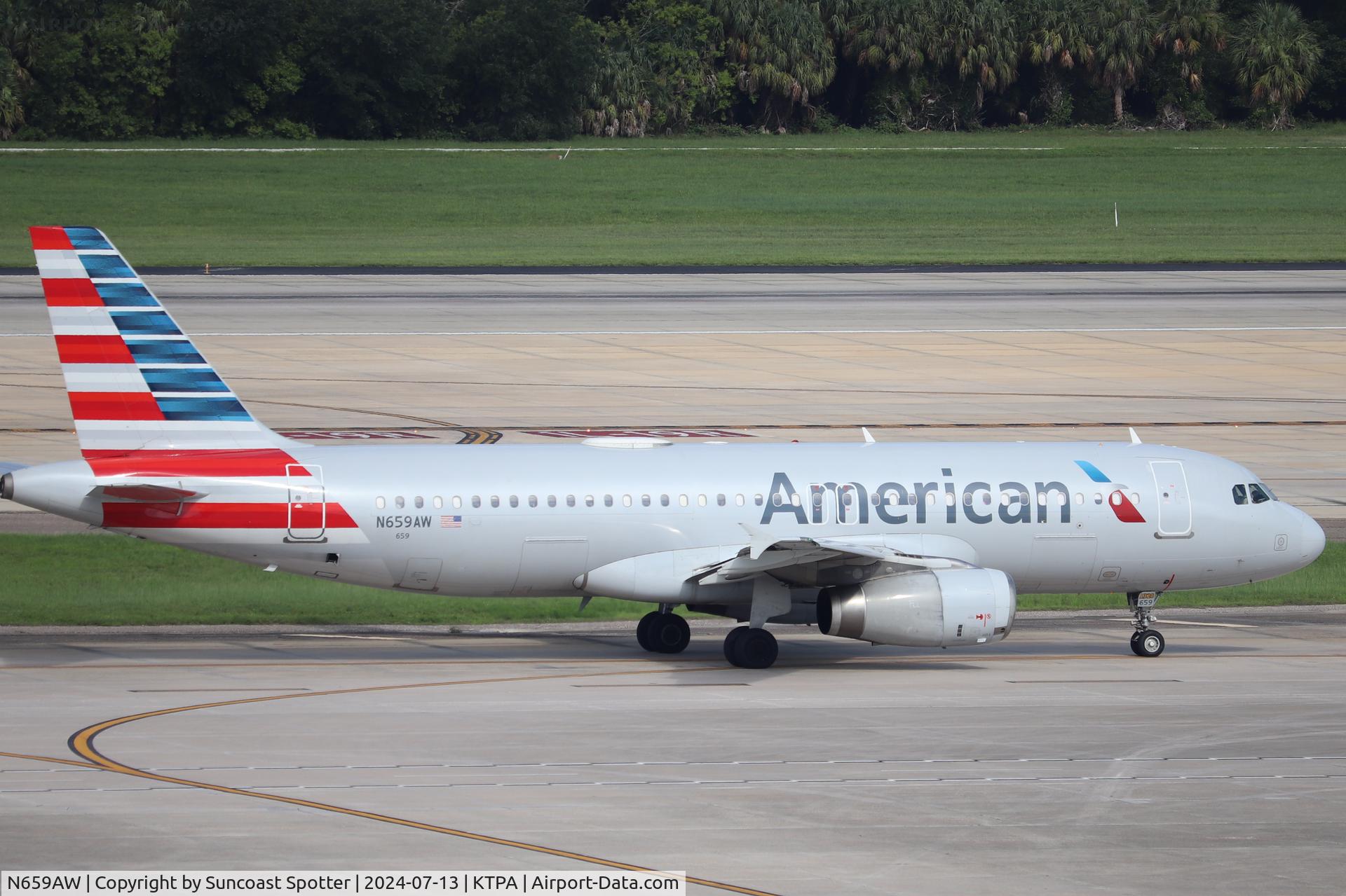 N659AW, 2000 Airbus A320-232 C/N 1166, American Flight 2338 taxis at Tampa International Airport prior to flight to Philadelphia International Airport