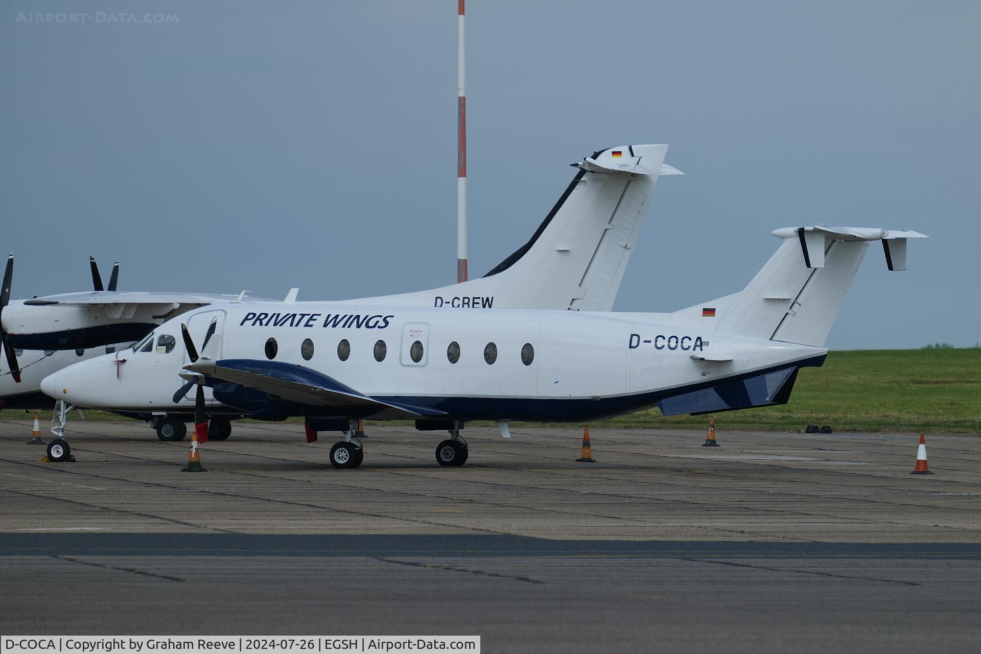 D-COCA, 1989 Dornier 228-202K C/N 8169, Parked at Norwich.