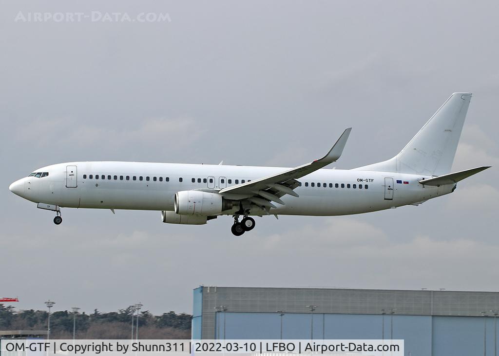 OM-GTF, 1998 Boeing 737-86J C/N 28070, Landing rwy 14L in all white c/s without titles...