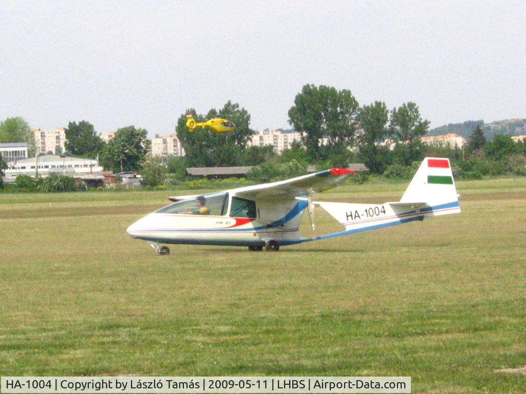 HA-1004, 1977 Brditschka HB-21 Movit C/N 21008, Taxiing. An EC-135 at the background...