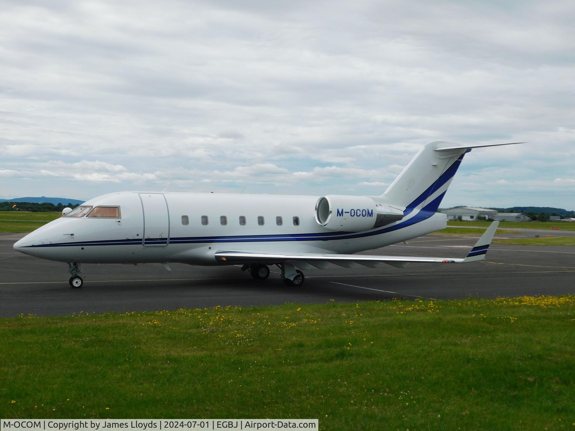 M-OCOM, 2005 Bombardier Challenger 604 (CL-600-2B16) C/N 5617, Taxing in at Gloucestershire Airport.