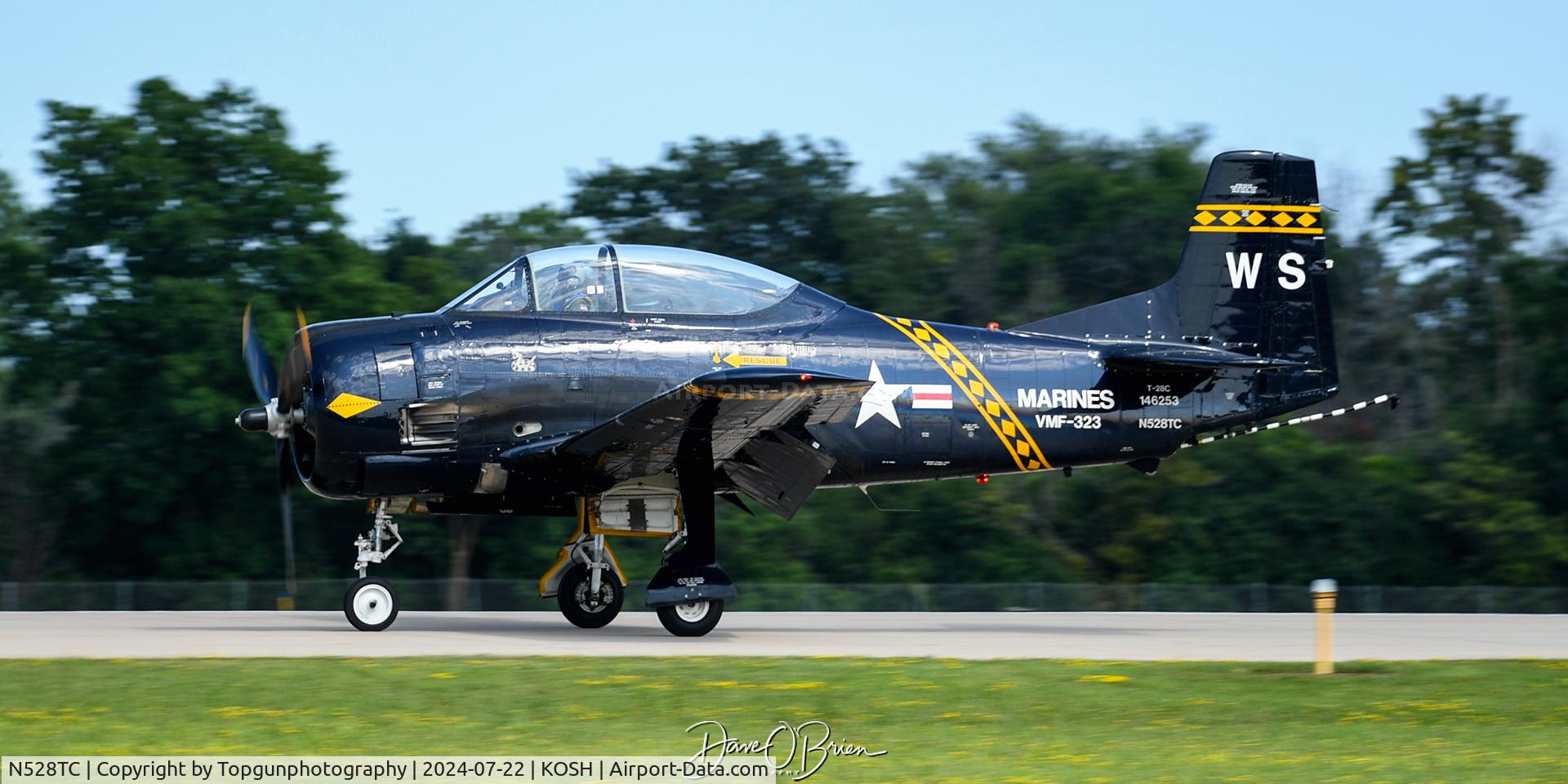 N528TC, 1957 North American T-28C Trojan C/N 252-16, touching down at Oshkosh 24