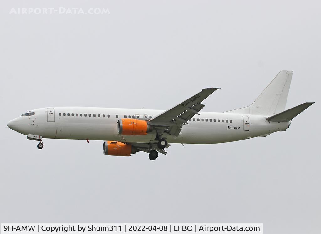 9H-AMW, 1992 Boeing 737-4Q8 C/N 26281, Landing rwy 32L... Yellow engines...