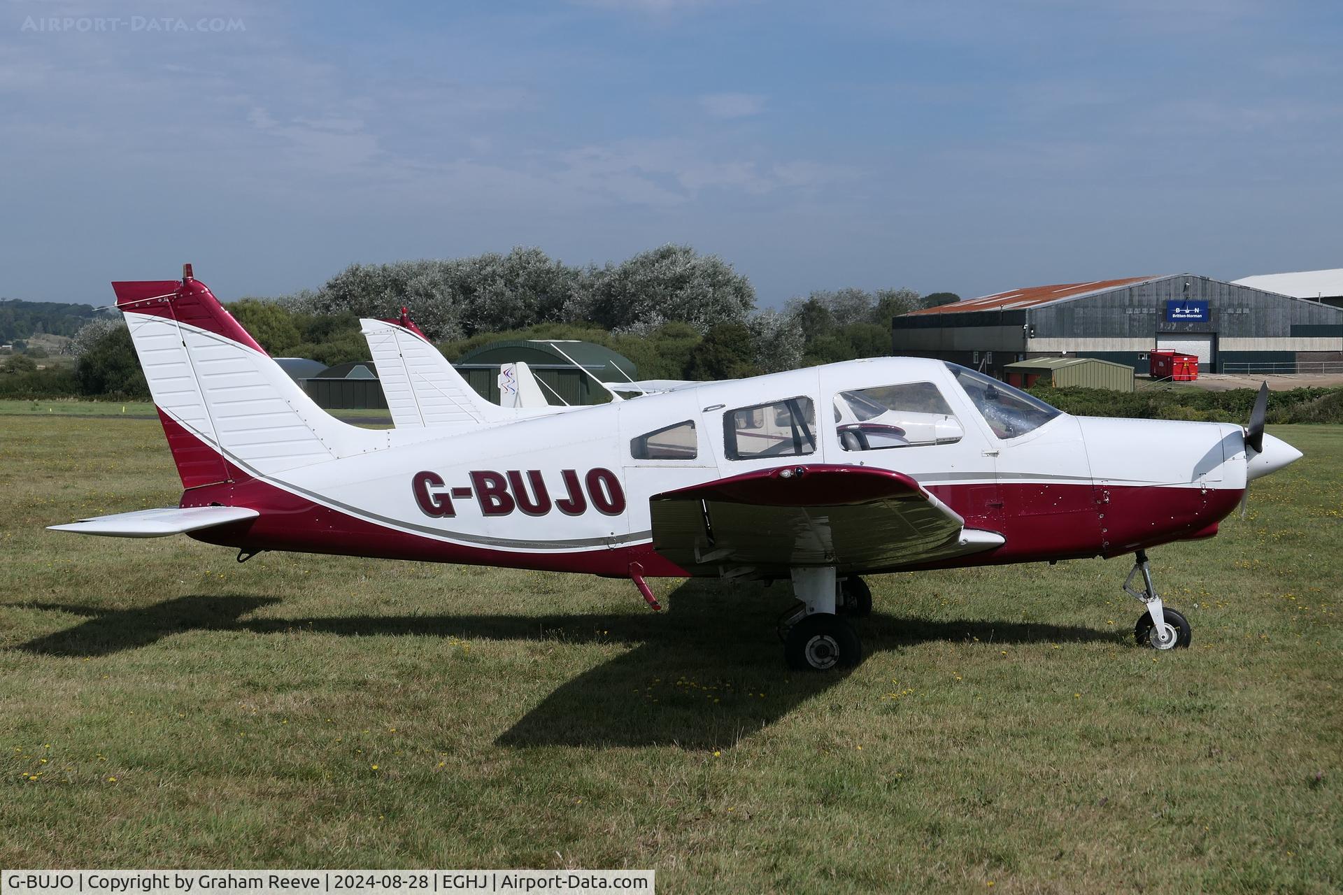 G-BUJO, 1977 Piper PA-28-161 Cherokee Warrior II C/N 28-7716077, Parked at Bembridge, Isle of Wight.