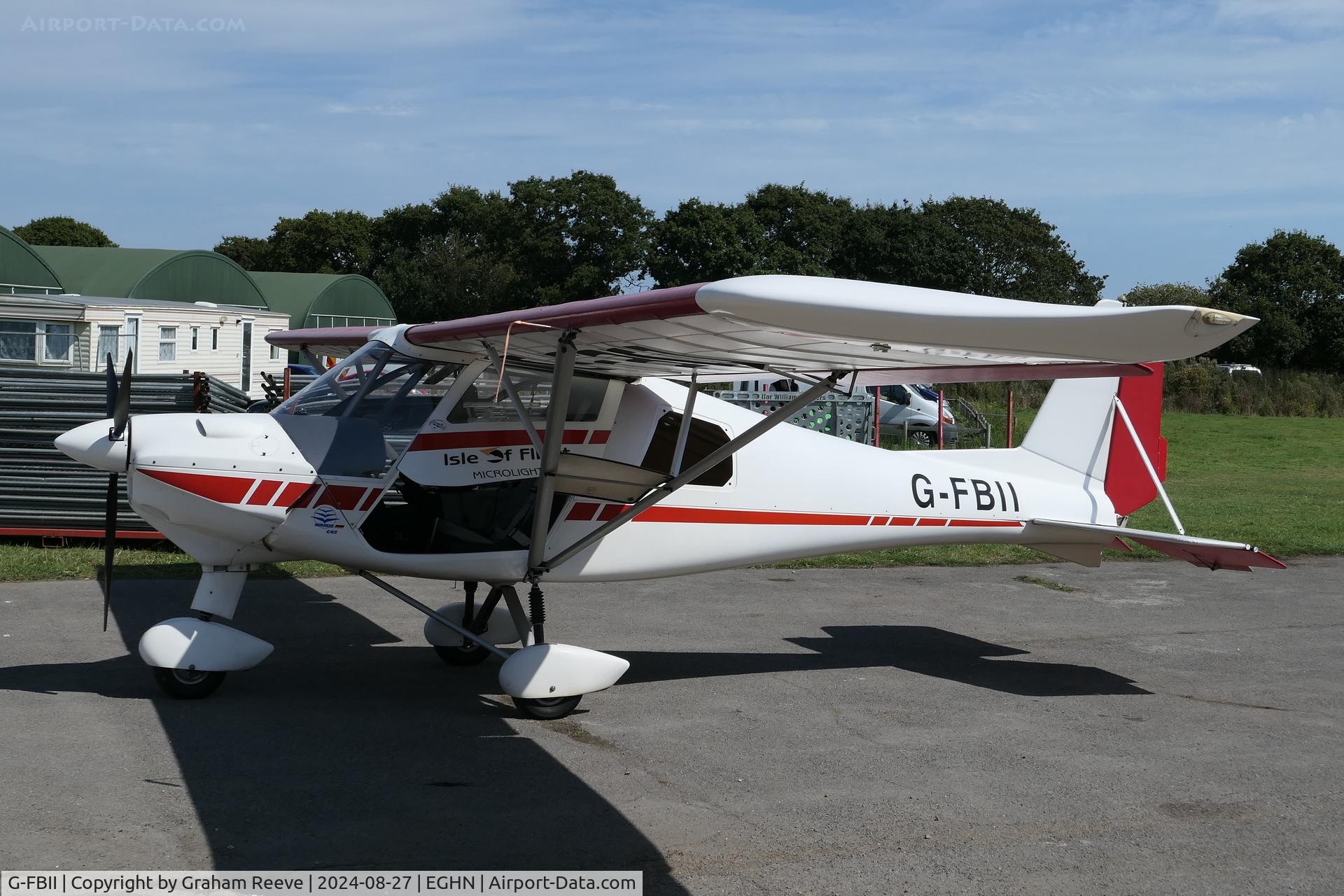 G-FBII, 2003 Comco Ikarus C42 FB100 C/N 0310-6574, Parked at Sandown, Isle of Wight.