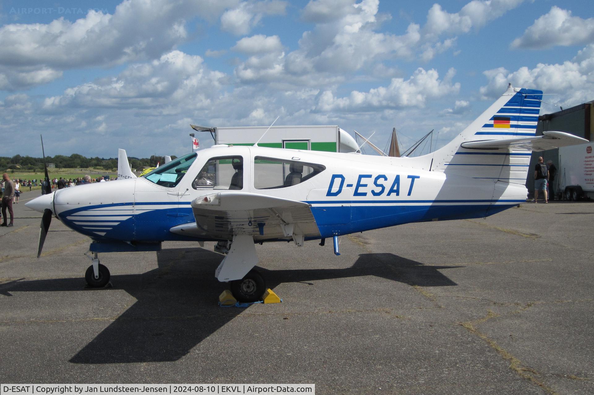 D-ESAT, Rockwell Commander 114B C/N 14551, Commander 114B D-ESAT seen at an airshow at the former Vaerloese Air Base in Denmark. A total of 154 Commander 114Bs were built between 1992 and 2000. The 4-seat aircraft has a 6-cylinder Lycoming engine.