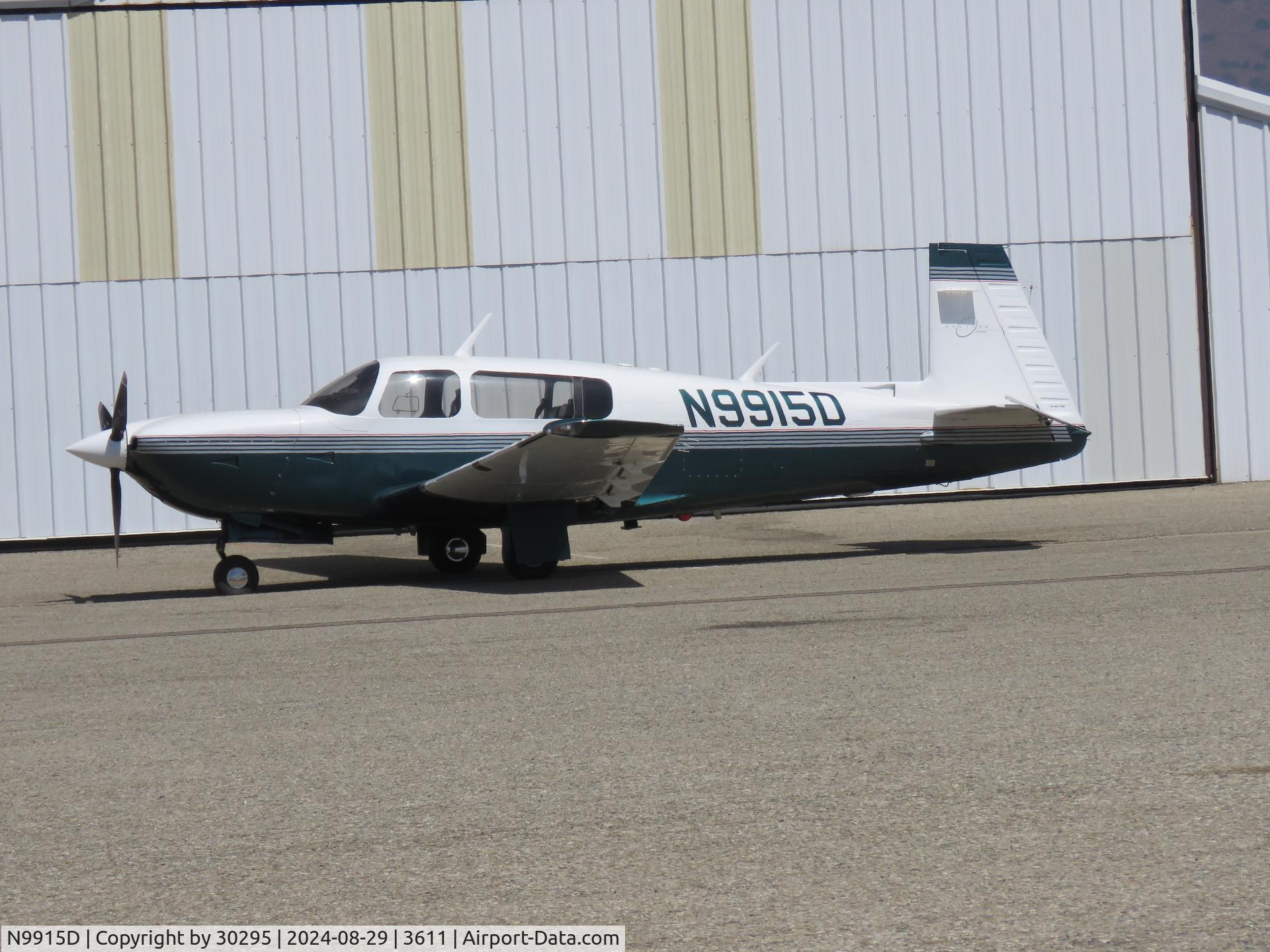 N9915D, 1996 Mooney M20R Ovation C/N 29-0090, By hanger