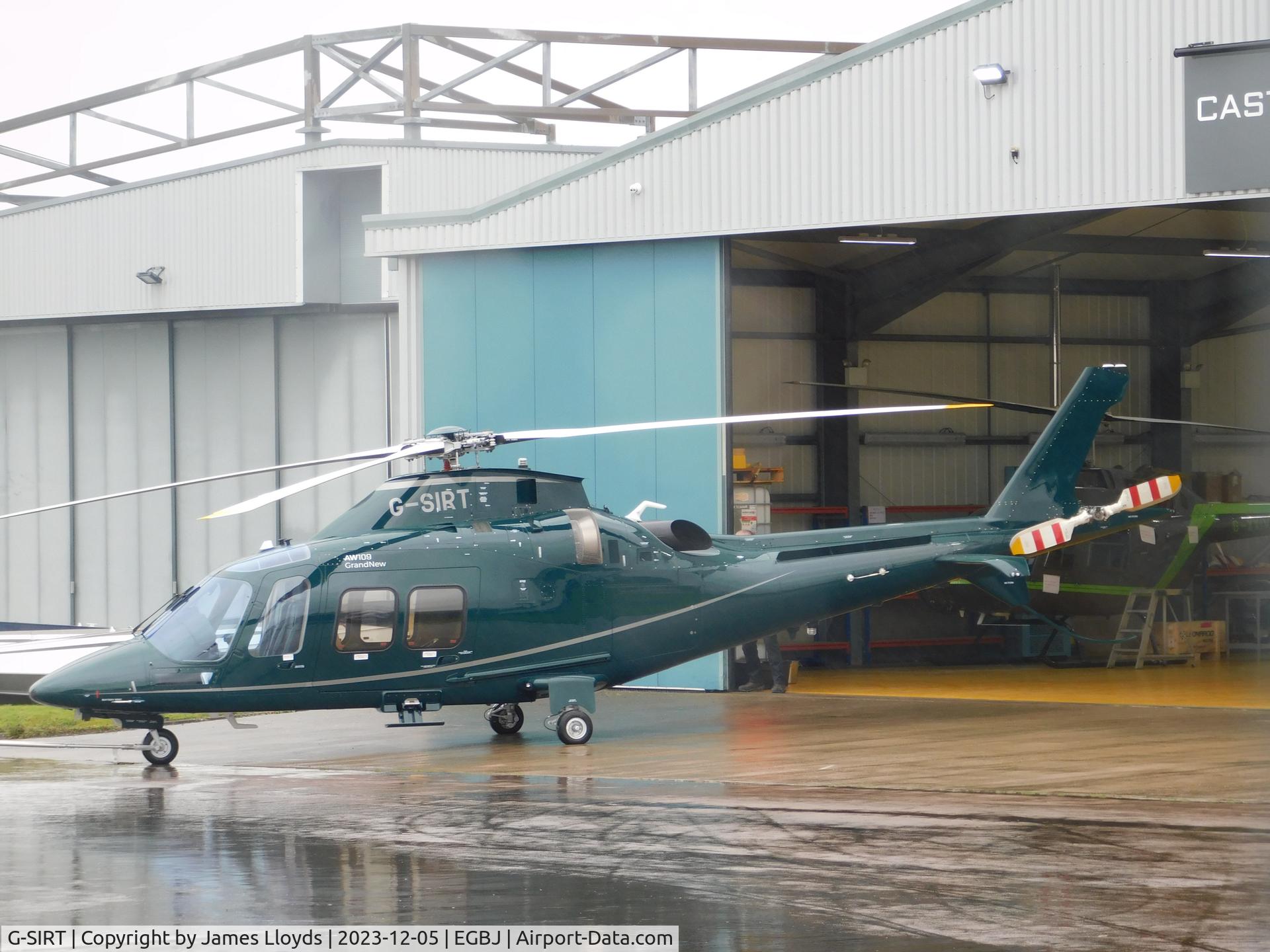 G-SIRT, 2023 Leonardo AW-109SP GrandNew C/N 22452, Being put into the Castle Air Hanger at Gloucestershire Airport.