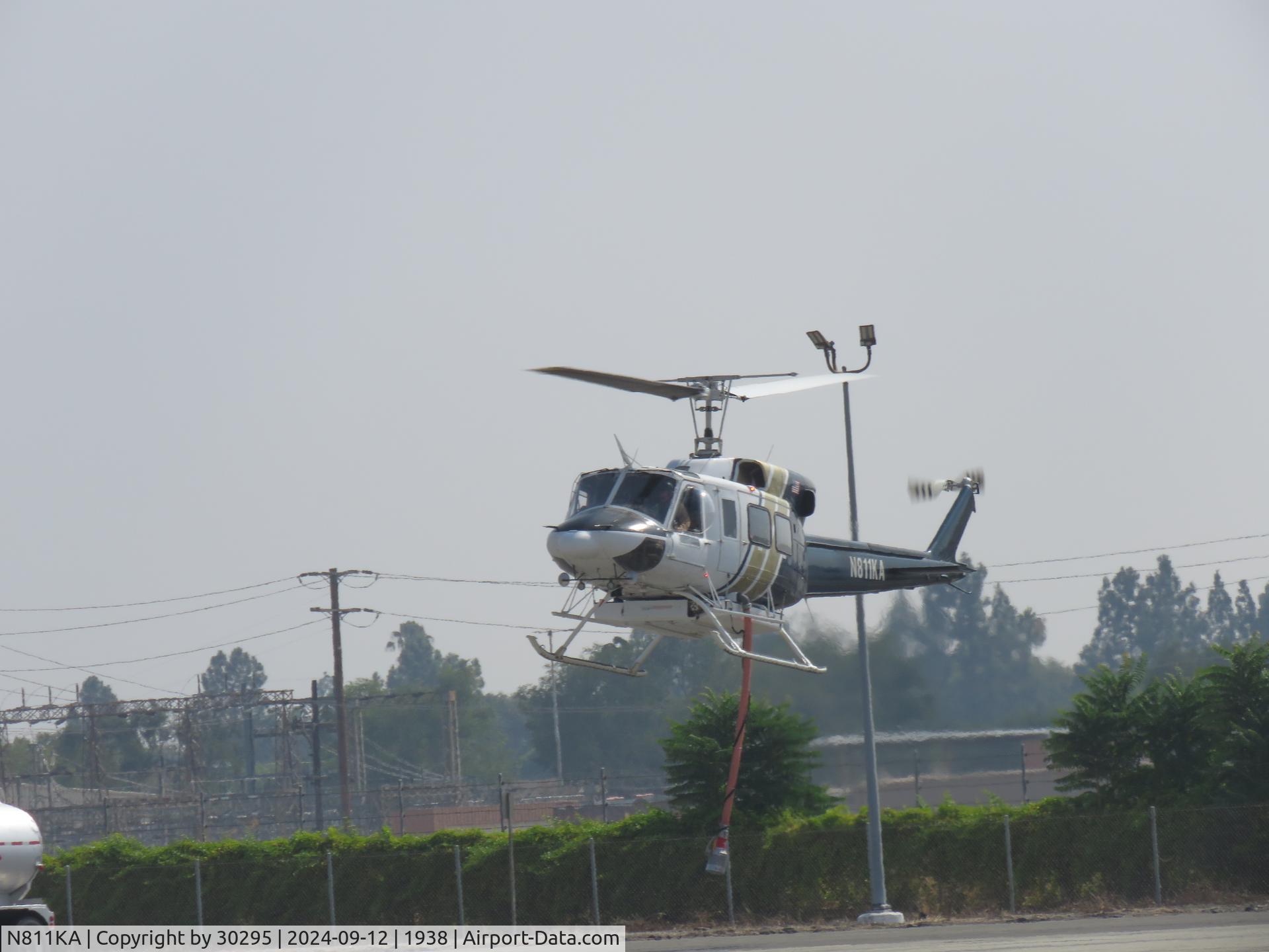 N811KA, 1974 Bell 212 C/N 30656, Lifting off