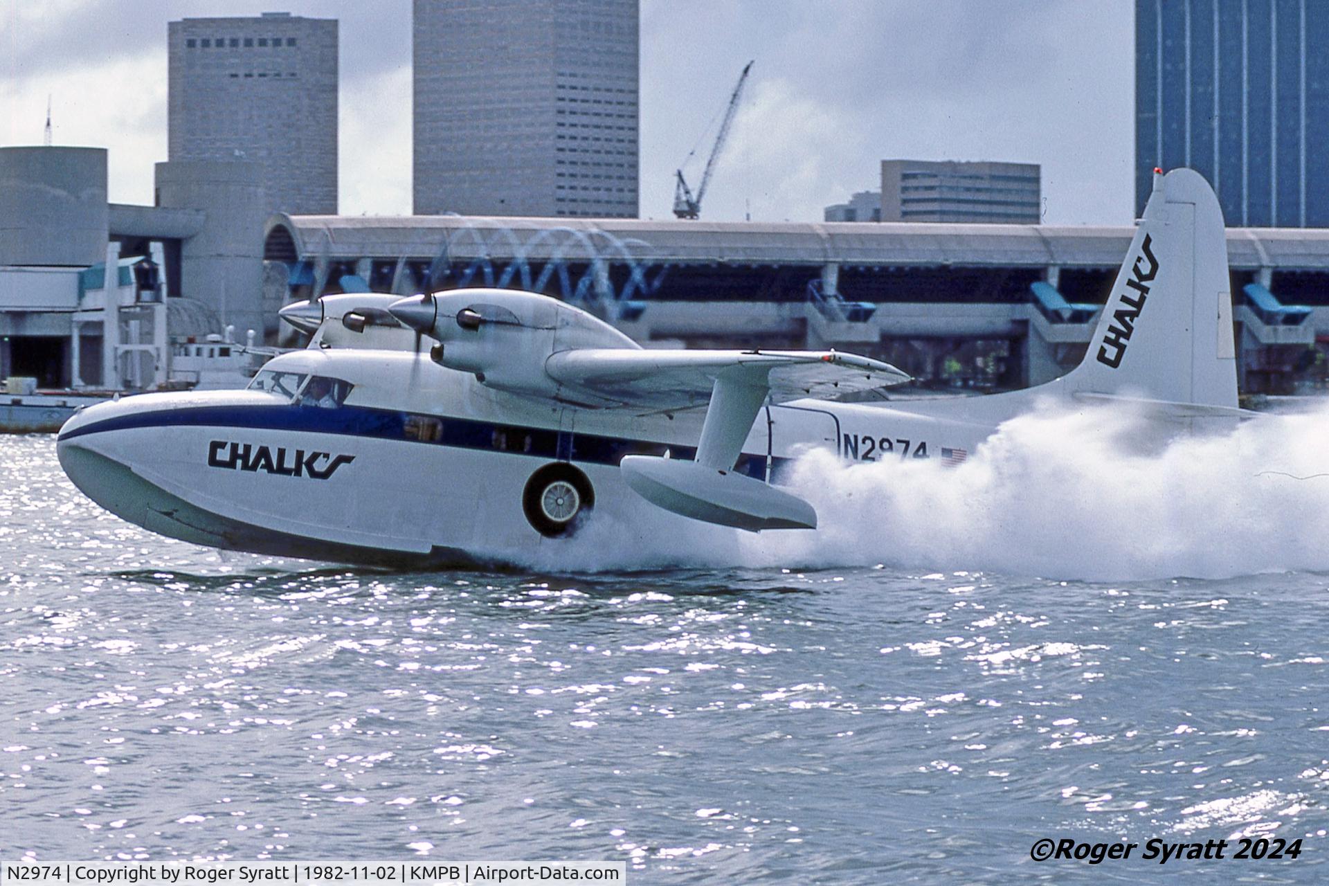 N2974, 1967 Grumman G-73T Mallard C/N J-36, Chalk's International Grumman Turbo Mallard N2974 photographed taking of from the Main Channel at Miami on 2nd November 1982, after leaving the company’s terminal at Miami Seaplane Base on Watson Island.