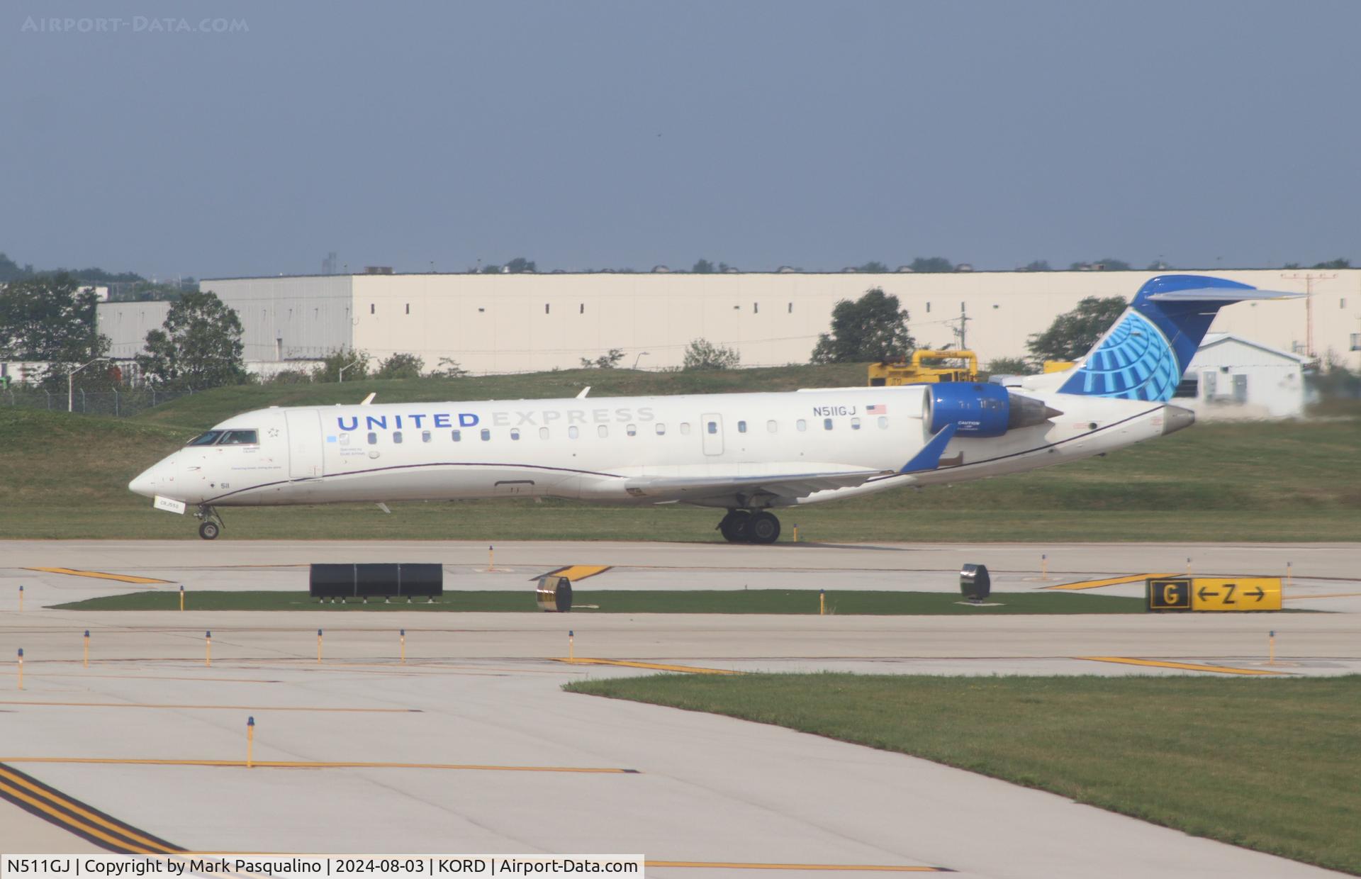 N511GJ, 2003 Bombardier CRJ-701 (CL-600-2C10) C/N 10128, CL-600-2C10