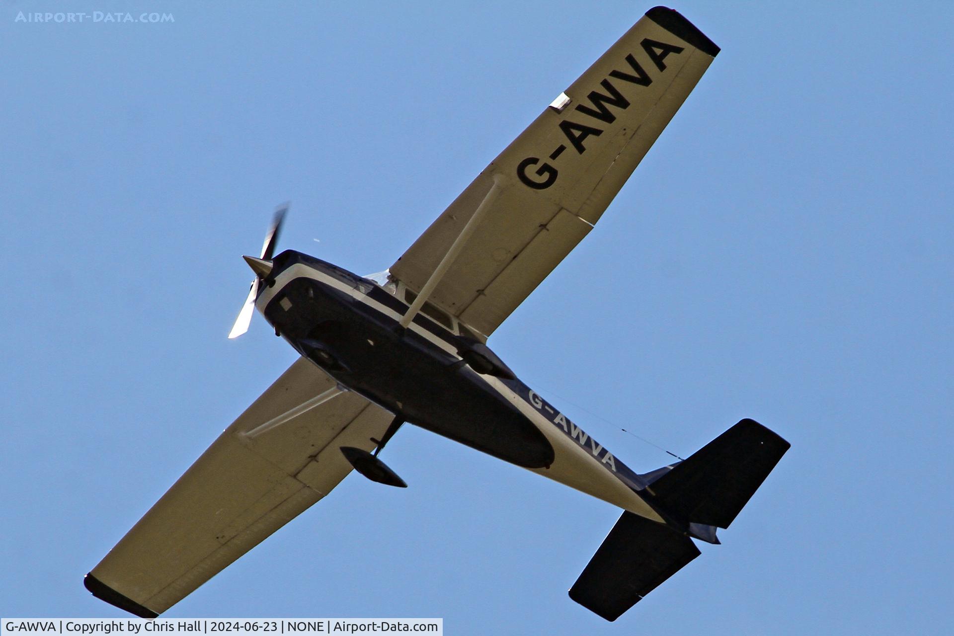 G-AWVA, 1968 Reims F172H Skyhawk C/N 0597, over Oulton Park race course