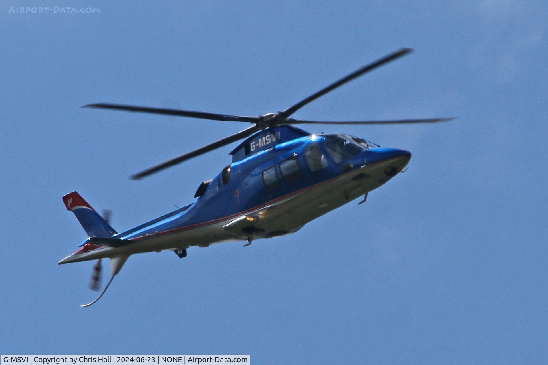 G-MSVI, 2006 Agusta A-109S Grand C/N 22028, over Oulton Park race course