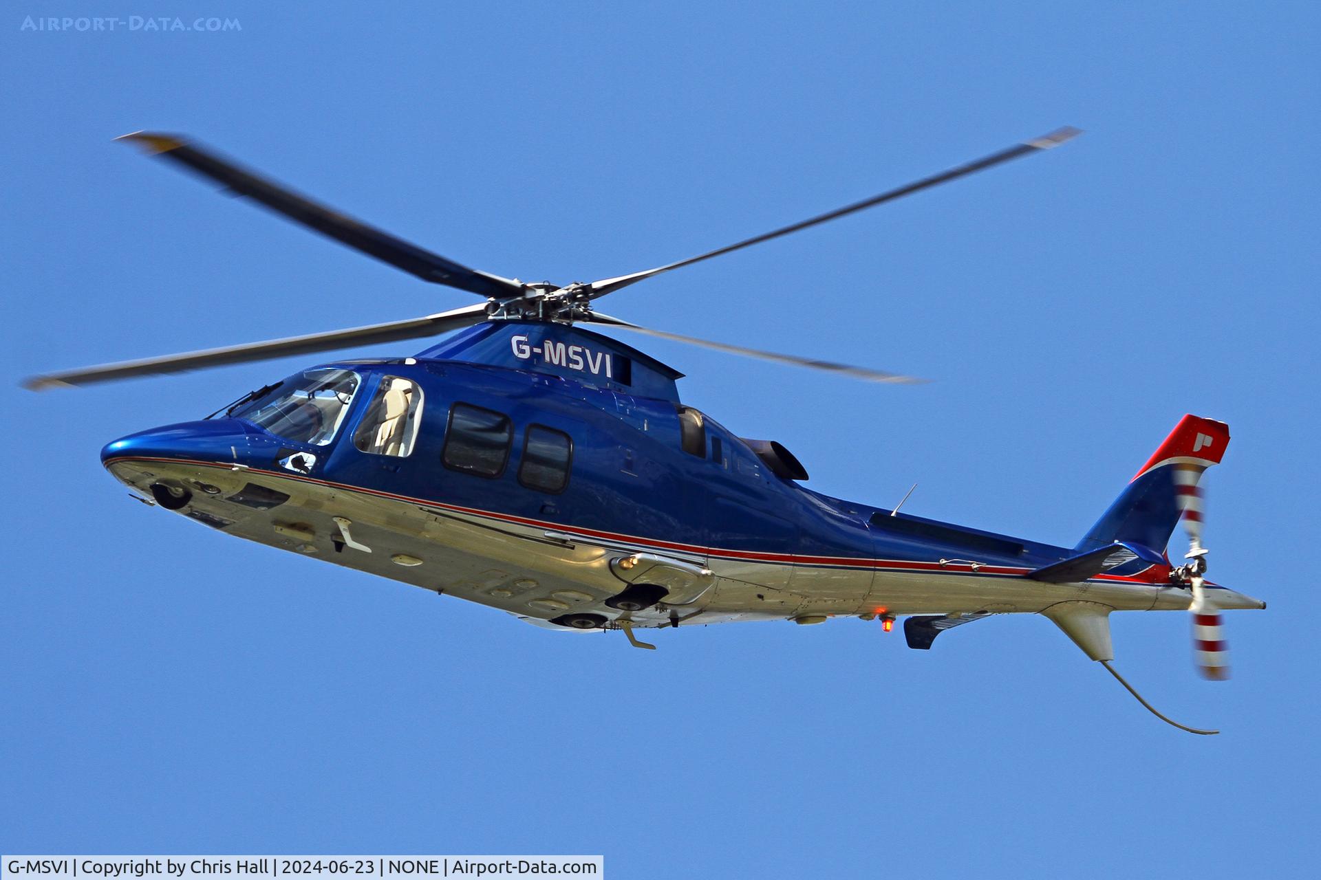 G-MSVI, 2006 Agusta A-109S Grand C/N 22028, over Oulton Park race course