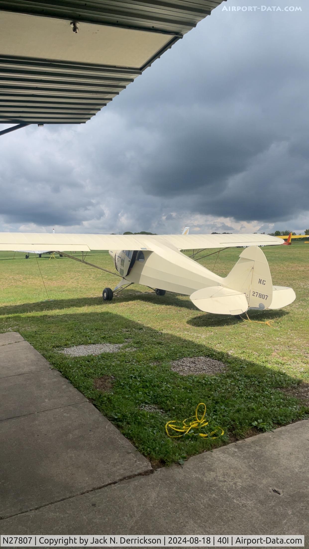 N27807, 1940 Piper J4 C/N 4-1023, Waiting for the rain to pass...