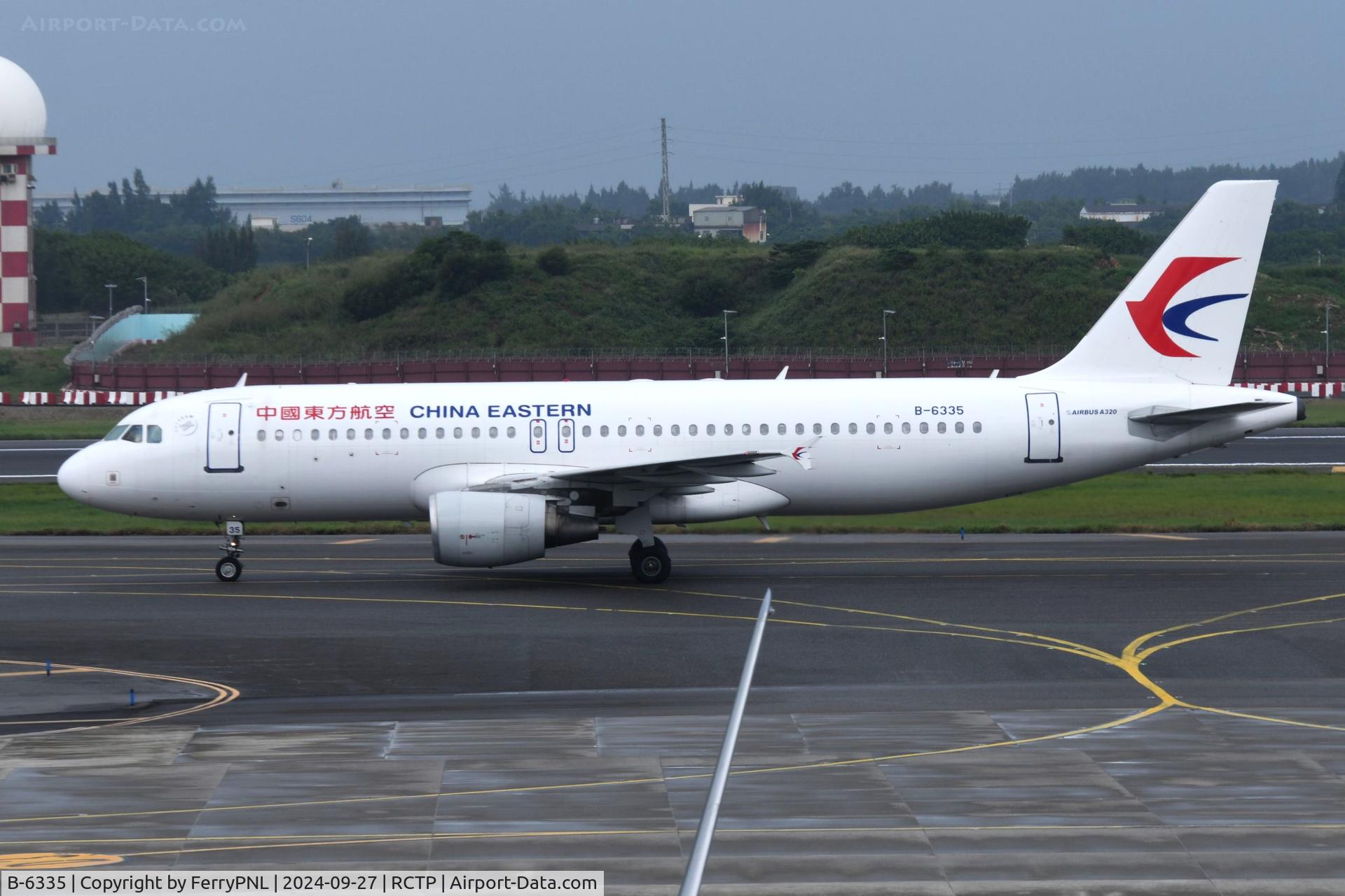 B-6335, 2007 Airbus A320-214 C/N 3197, China Eastern A320 taxying past