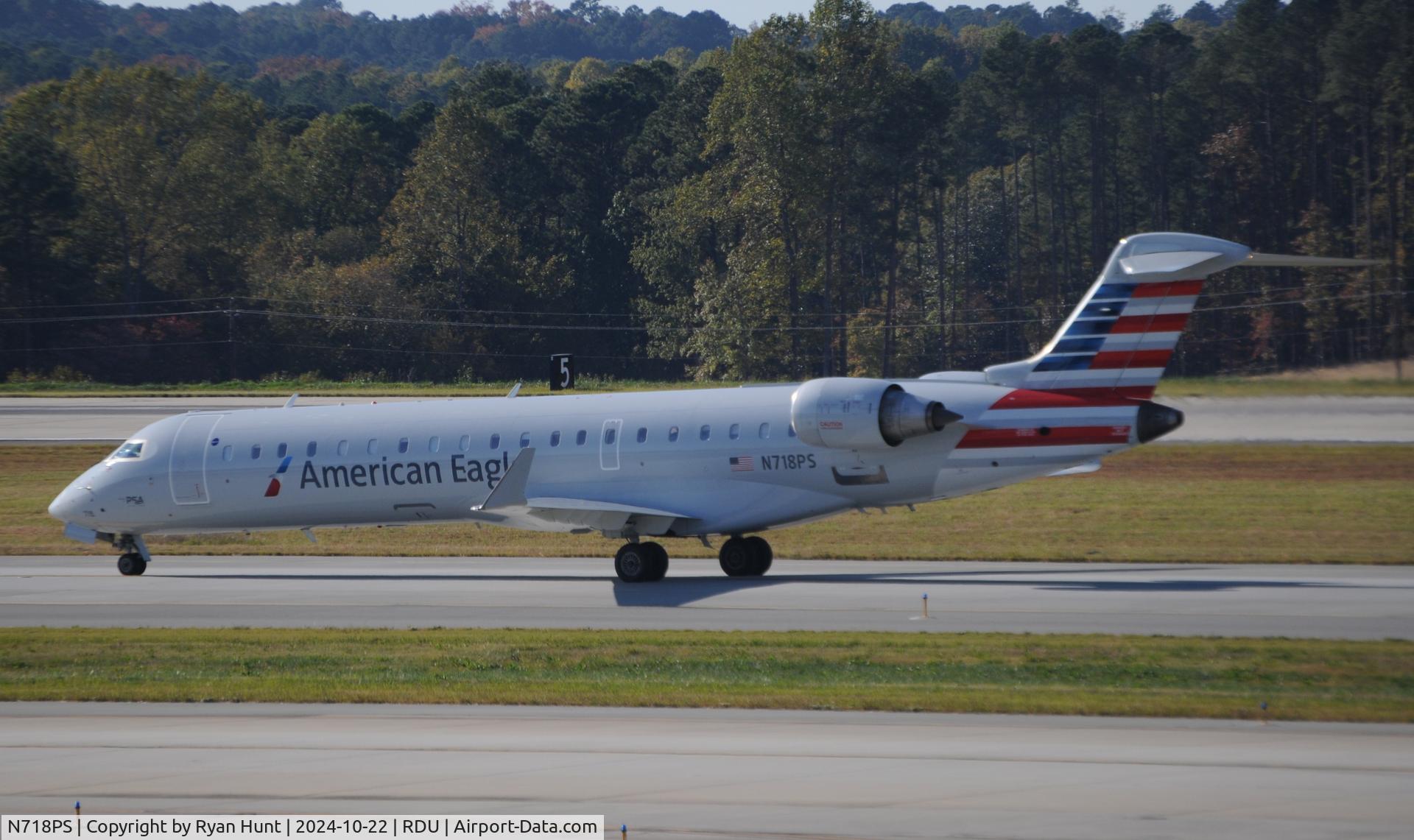 N718PS, 2004 Bombardier CRJ-701 (CL-600-2C10) Regional Jet C/N 10175, A Blue Streak that came in from DCA. First photo on the site in American Eagle colors!