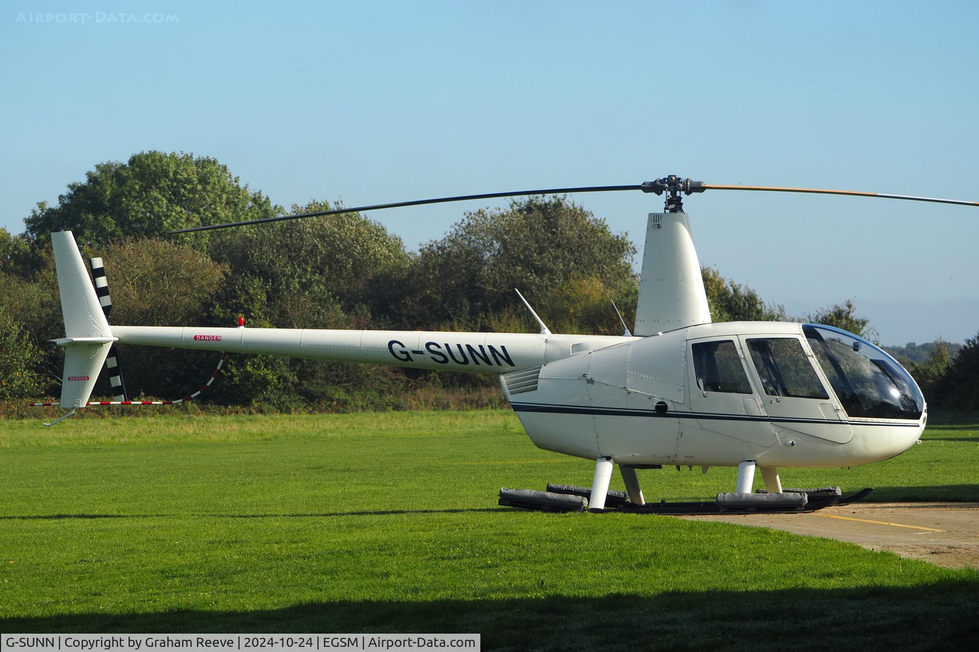 G-SUNN, 2004 Robinson R44 Clipper C/N 1367, Parked at Beccles.