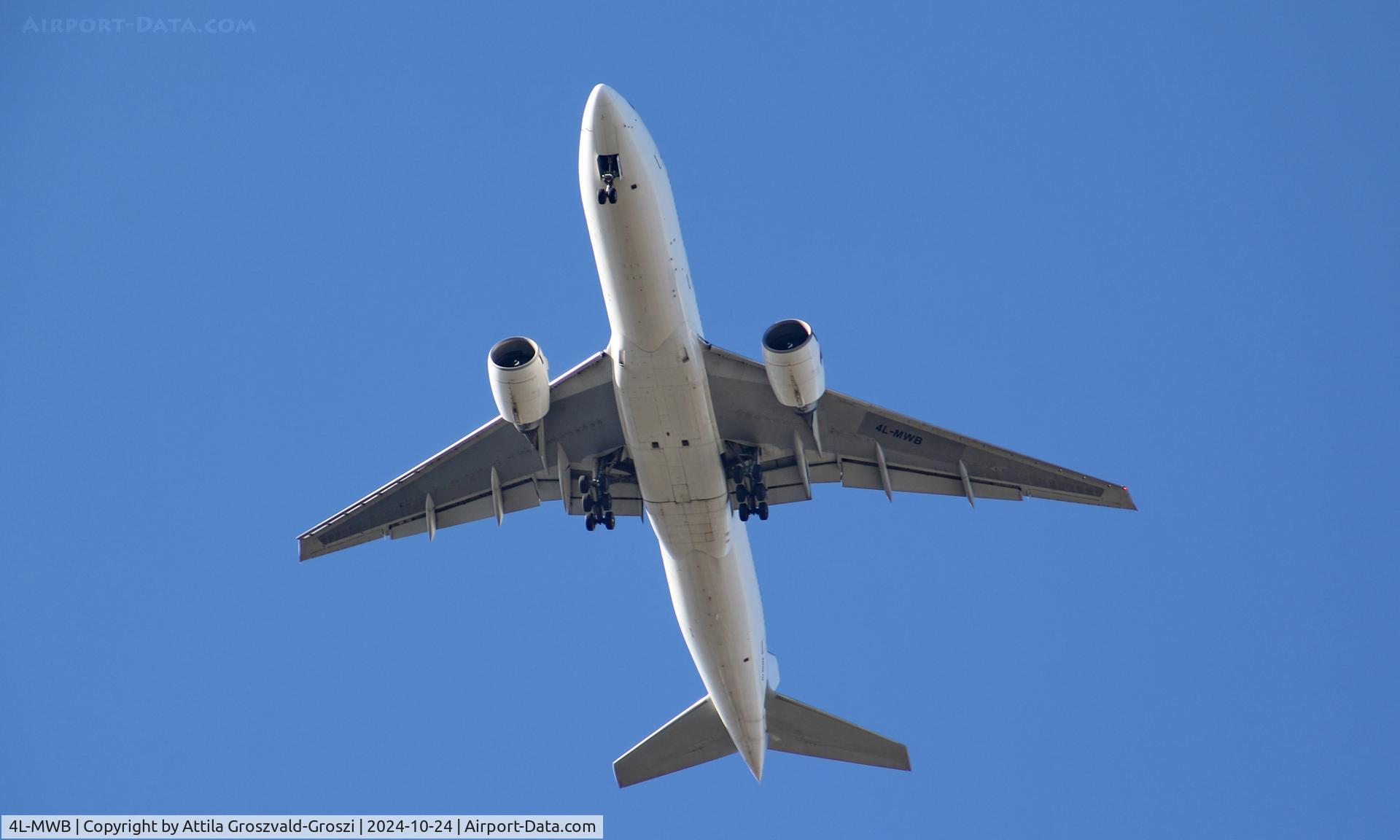 4L-MWB, 2003 Boeing 777-246/ER C/N 32891, In the airspace of Budapest, Hungary