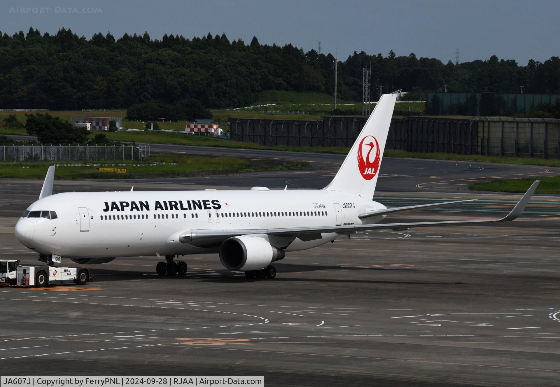 JA607J, 2003 Boeing 767-346/ER C/N 33496, JAL B763 under tow to its gate