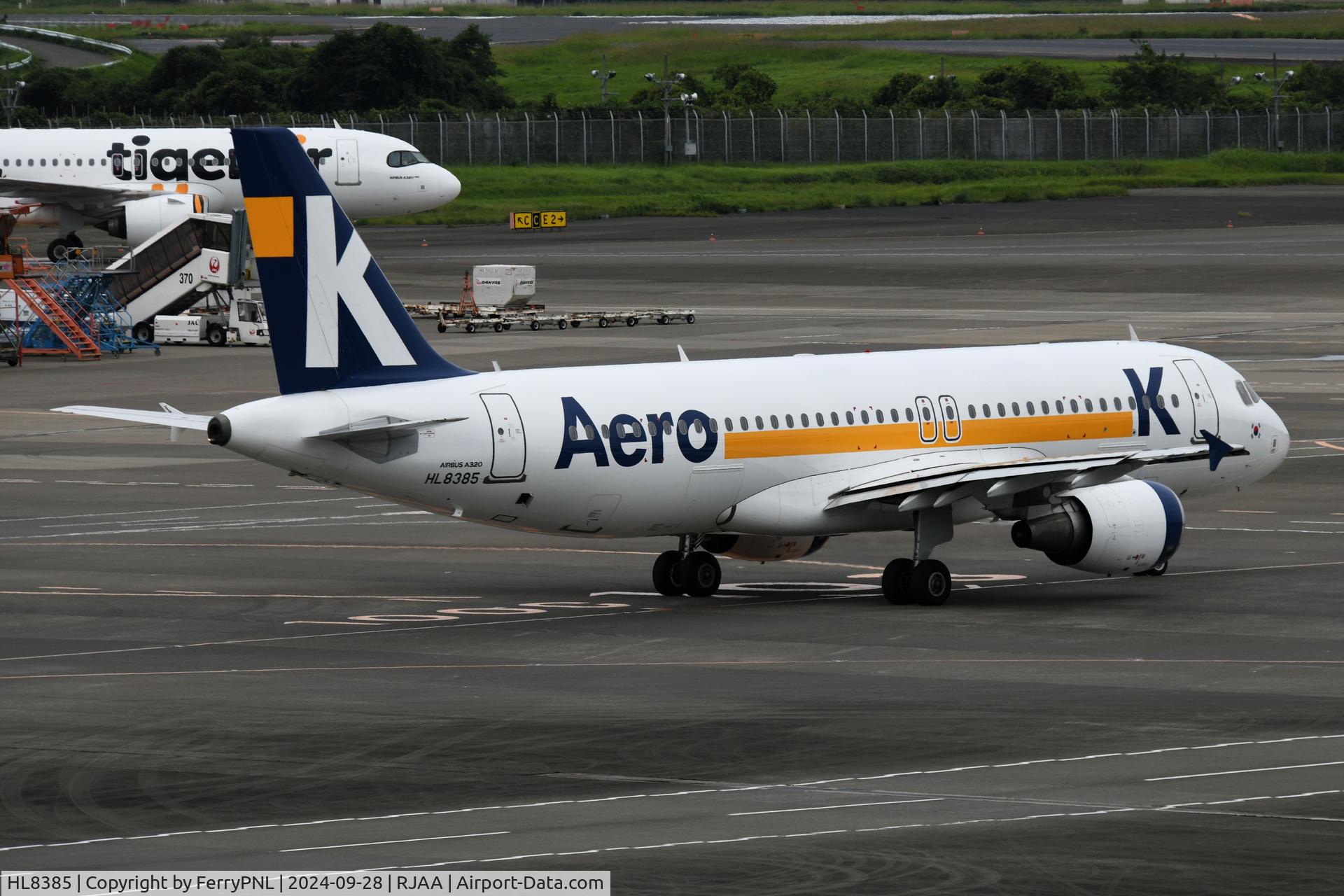 HL8385, 2010 Airbus A320-214 C/N 4480, Aero-K A320 seen from its yellow side, departing NRT