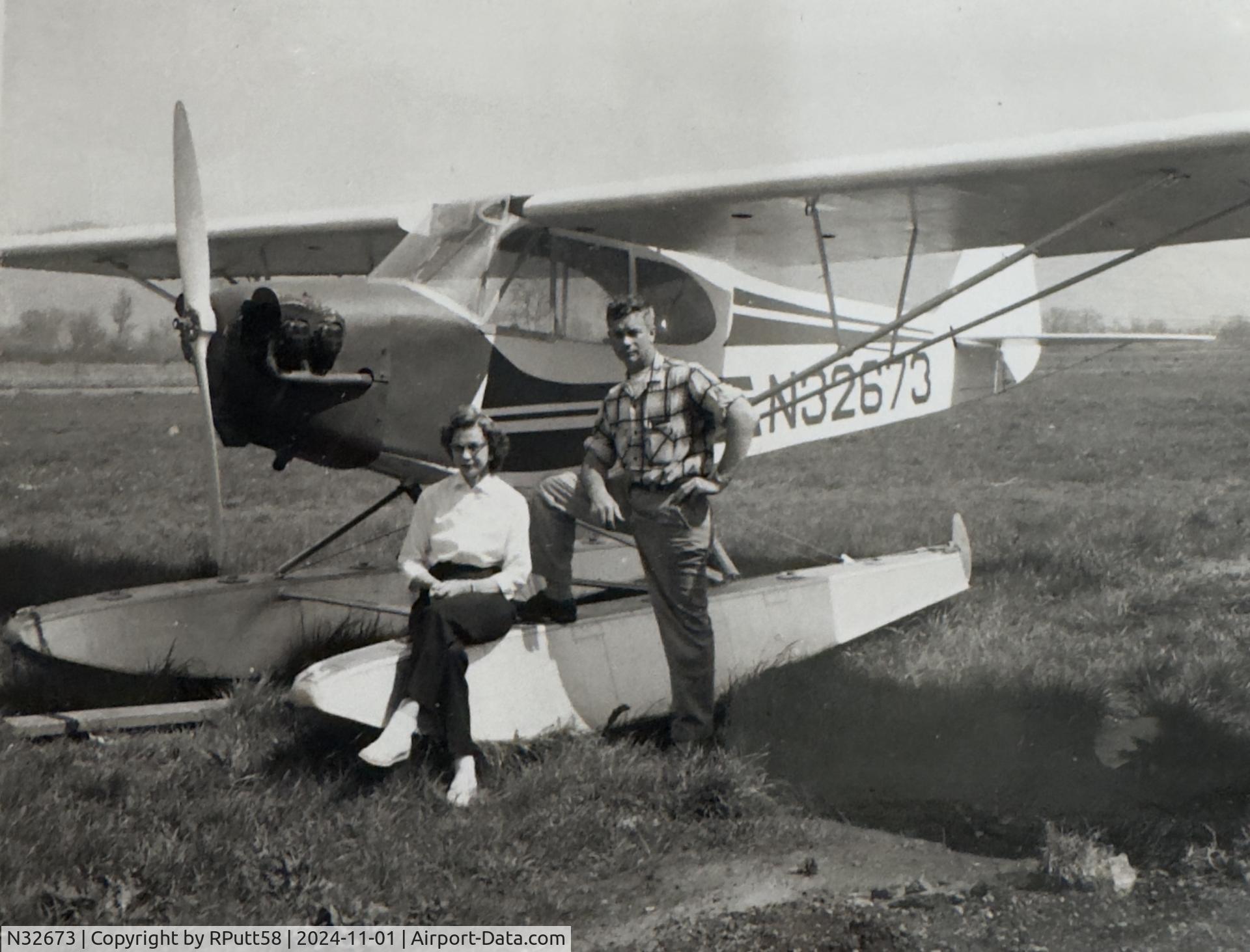 N32673, 1940 Piper J3C-65S Cub C/N 5532, A relative here in Oregon gave me a book with a bunch of airplane pictures... there are 5 or 6 pictures of this plane, before and after this gentleman restored it. I'm guessing early 50's