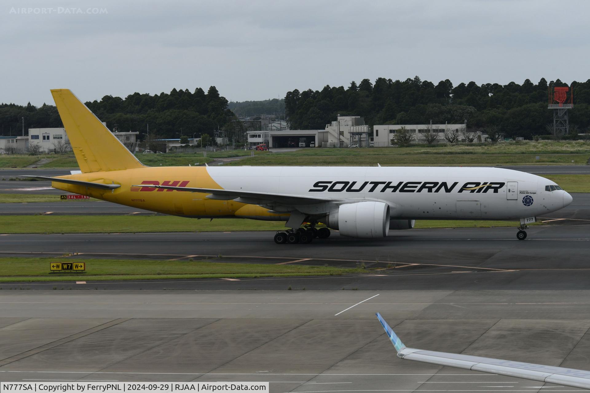 N777SA, 2012 Boeing 777-FZB C/N 37989, Polar Air operating this Southern Air B772 in DHL colors.