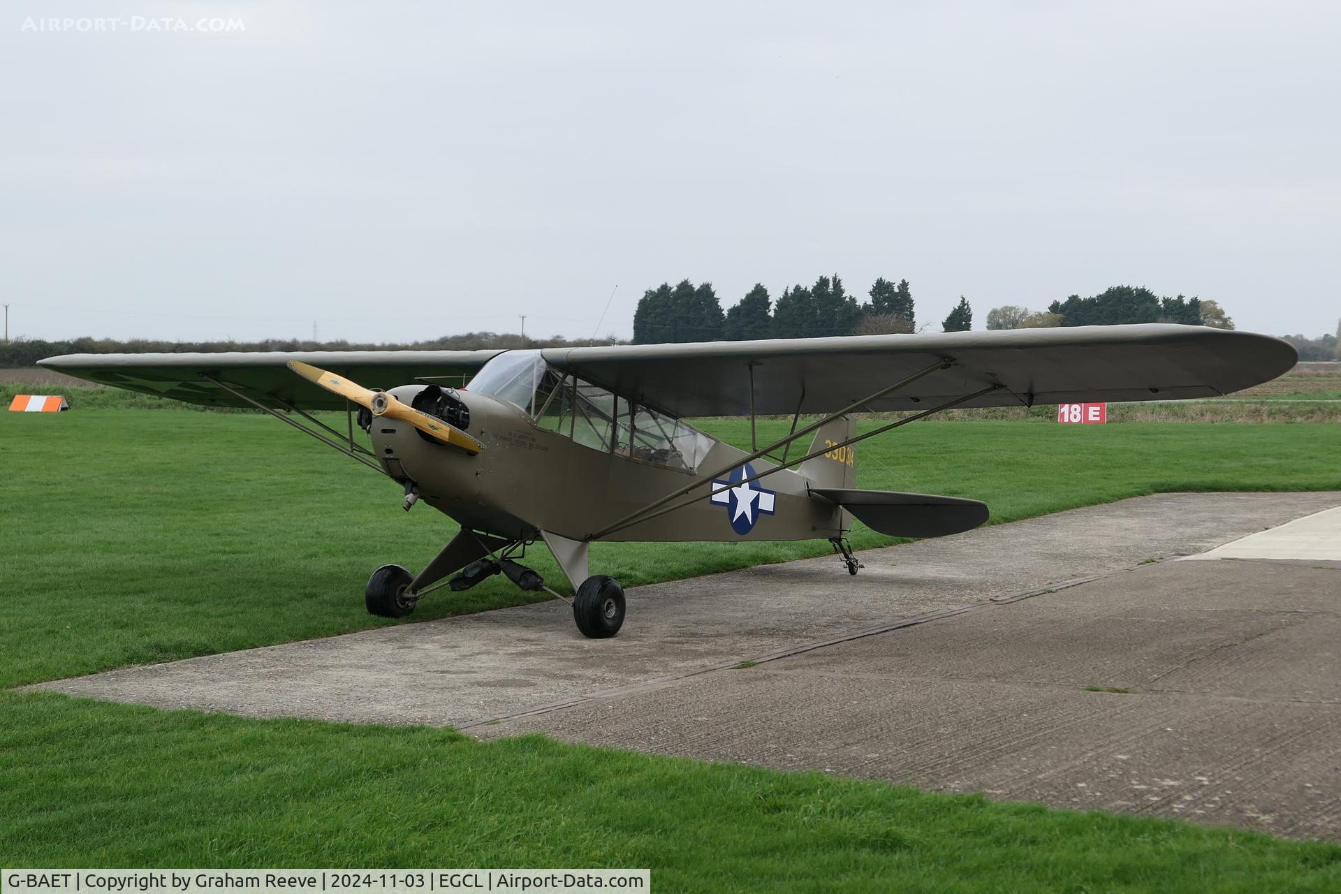 G-BAET, 1946 Piper L-4H Grasshopper (J3C-65D) C/N 11605, Parked at Fenland.