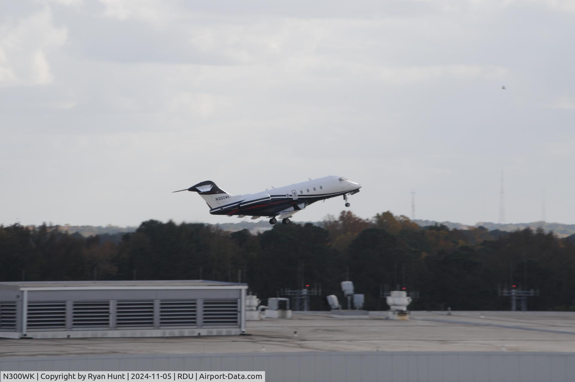 N300WK, 2006 Bombardier Challenger 300 (BD-100-1A10) C/N 20117, Private Bombardier departing.