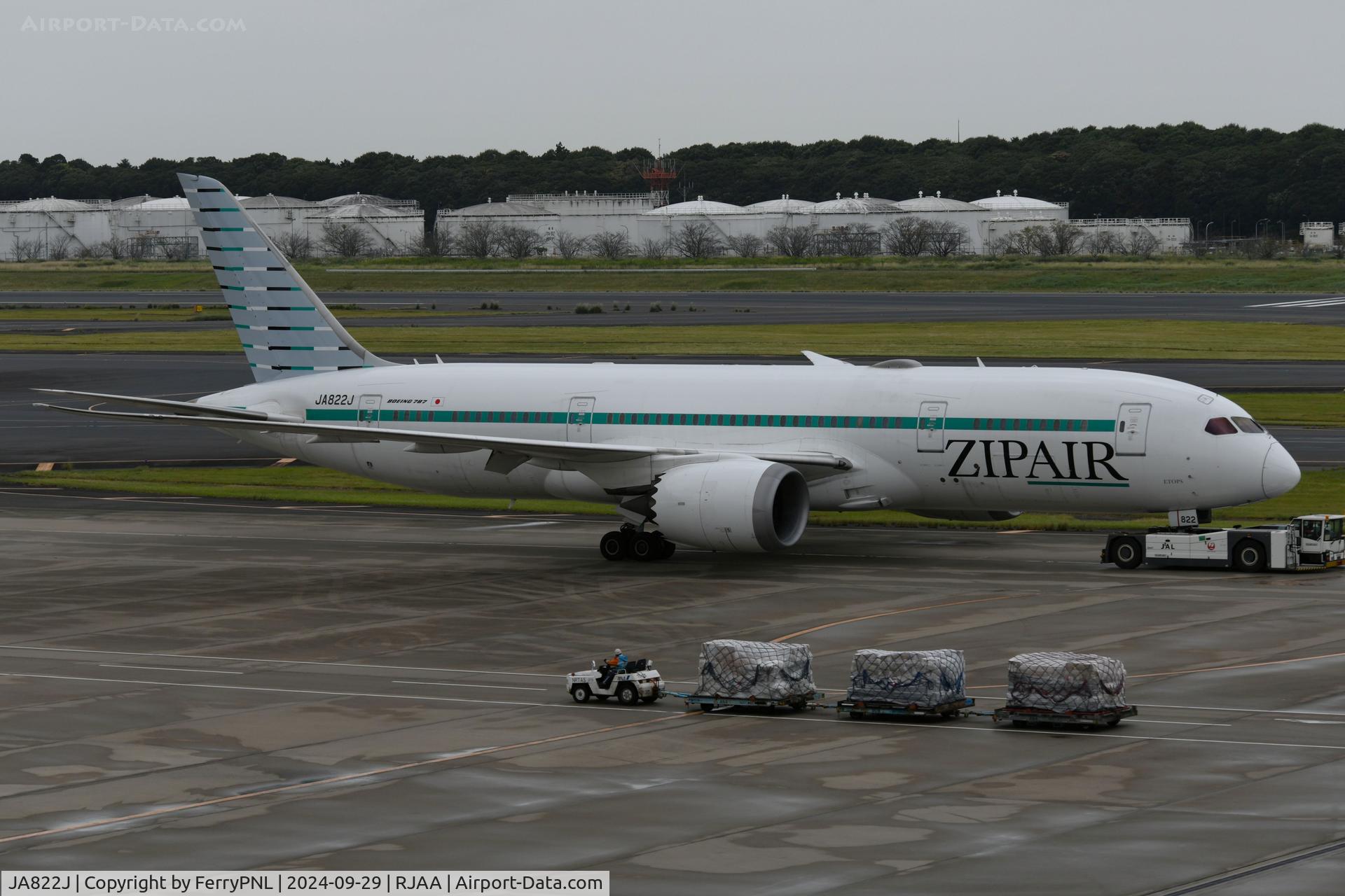 JA822J, 2010 Boeing 787-8 Dreamliner C/N 34832, Zipair B788 under tow to its gate