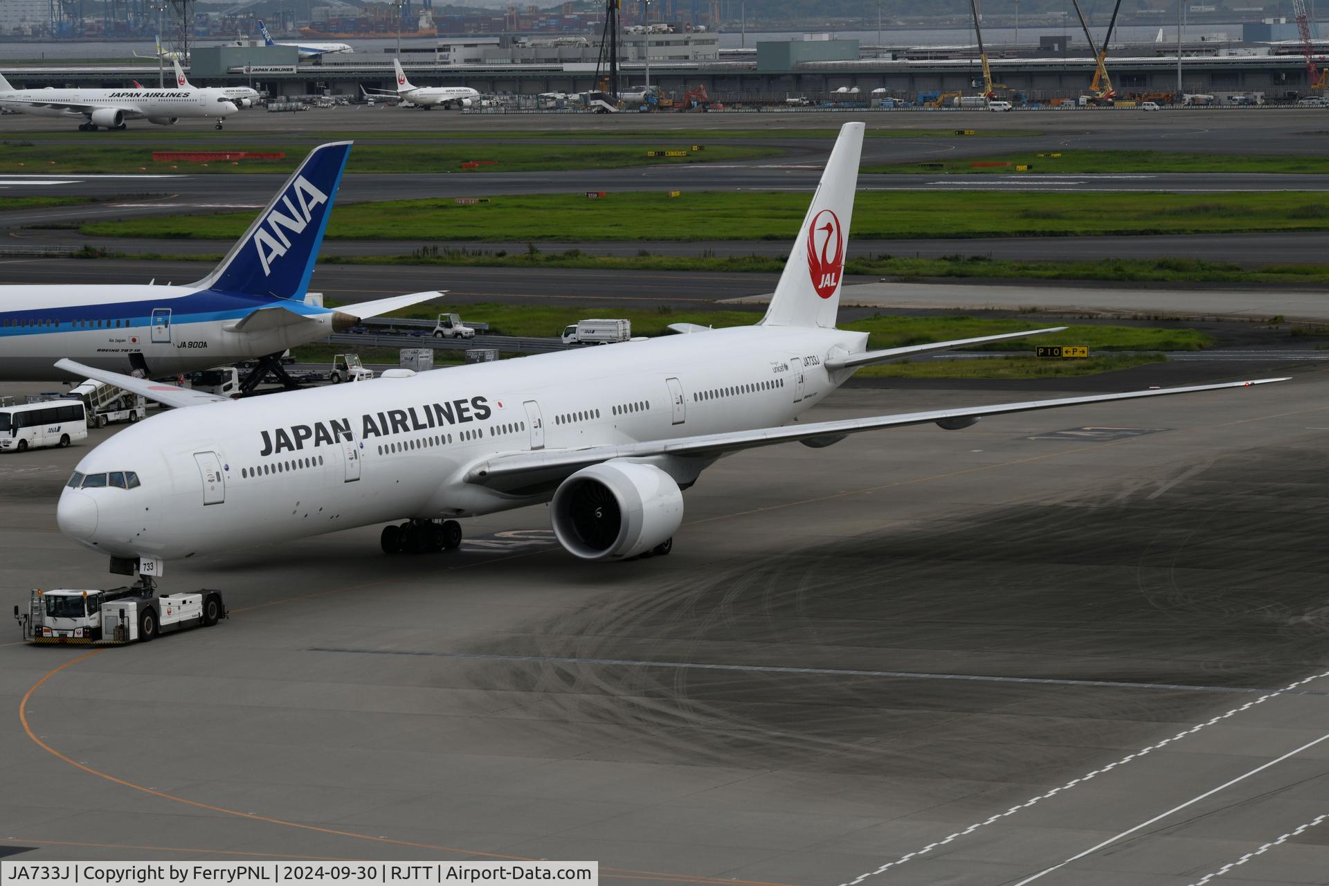 JA733J, 2005 Boeing 777-346/ER C/N 32432, B773 of JAL under tow to its gate